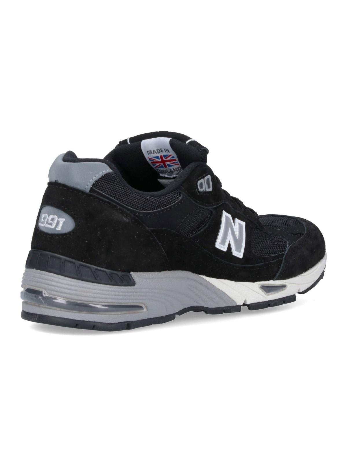Shop New Balance 991v1 Sneakers In Black