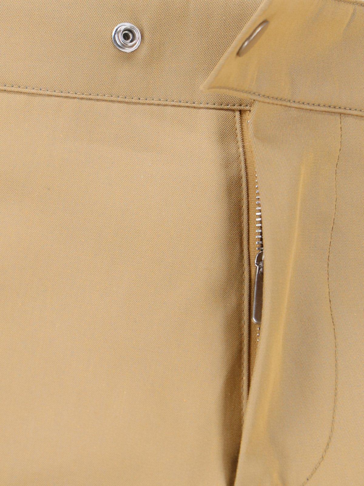 Shop Burberry Straight-leg Buckle-detailed Trousers In Beige