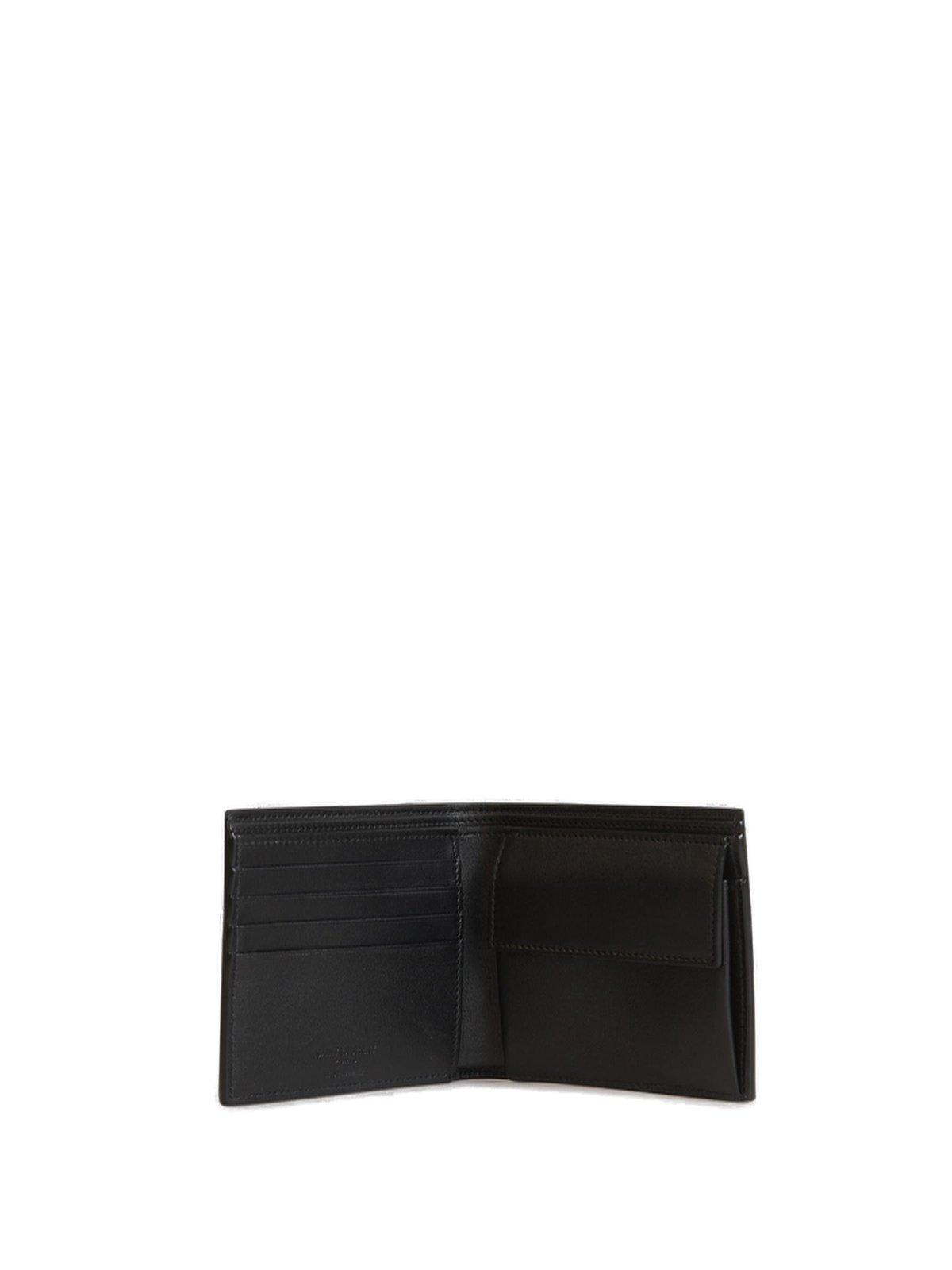 Shop Saint Laurent Logo Engraved Bifold Wallet In Black