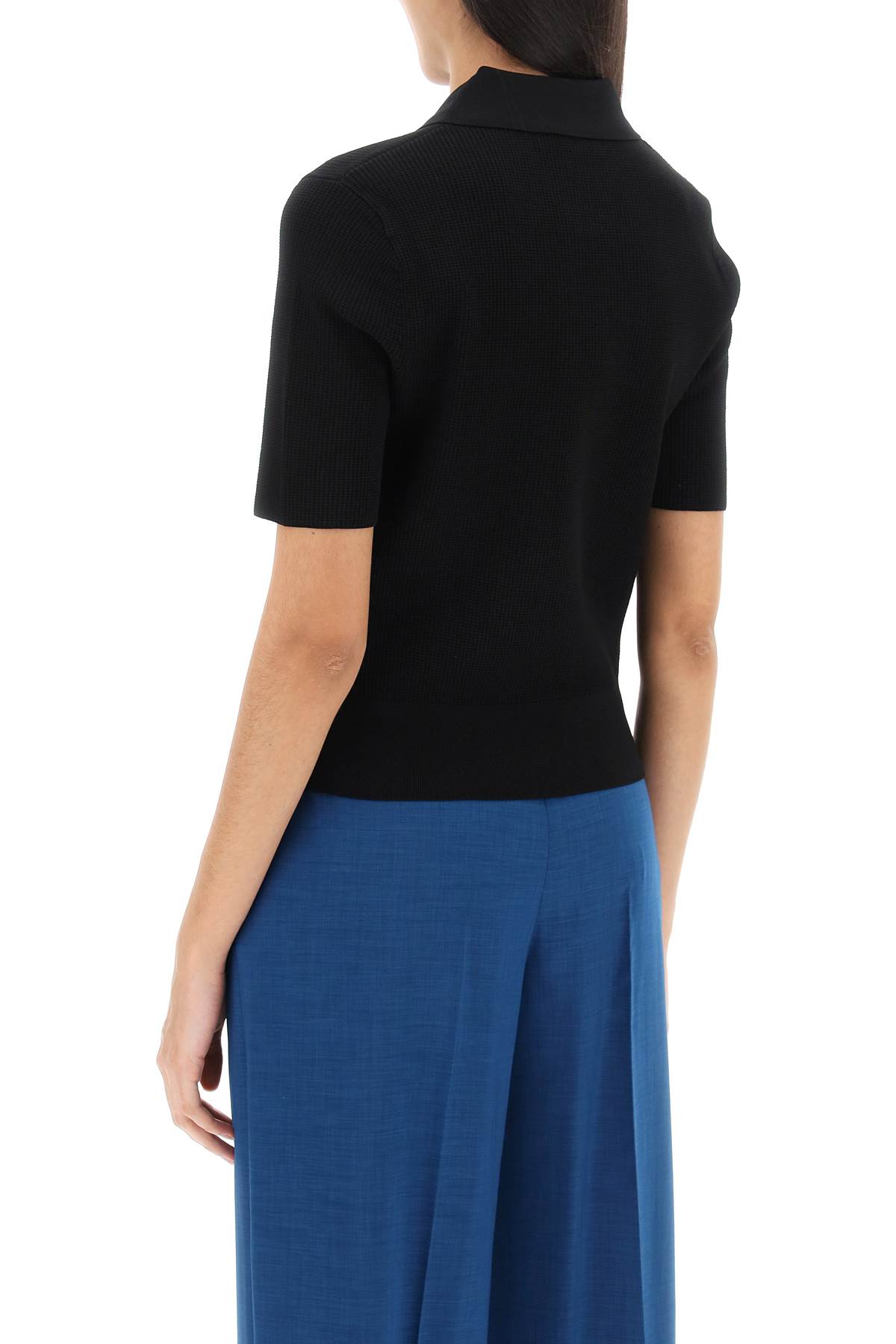 Shop Tory Burch Knitted Polo Shirt In Black (black)