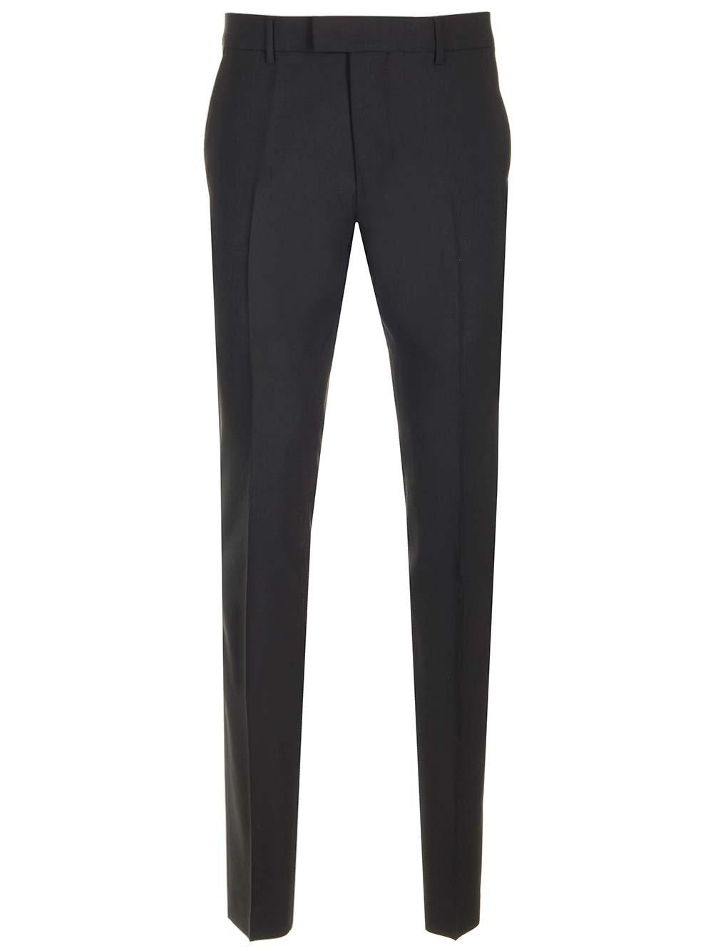 AMI ALEXANDRE MATTIUSSI PARIS LOW-RISE TAPERED TROUSERS