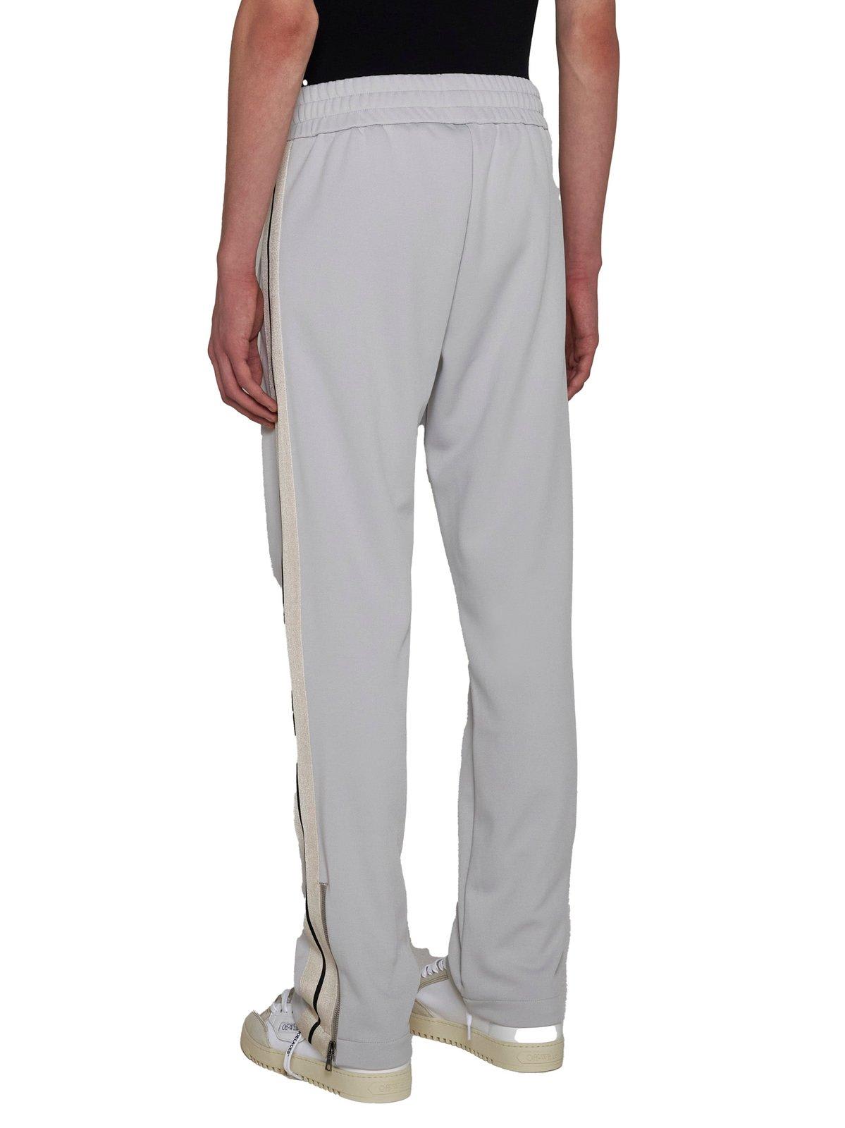 Shop Palm Angels Logo Embroidered Side Stripe Detailed Pants In Grey