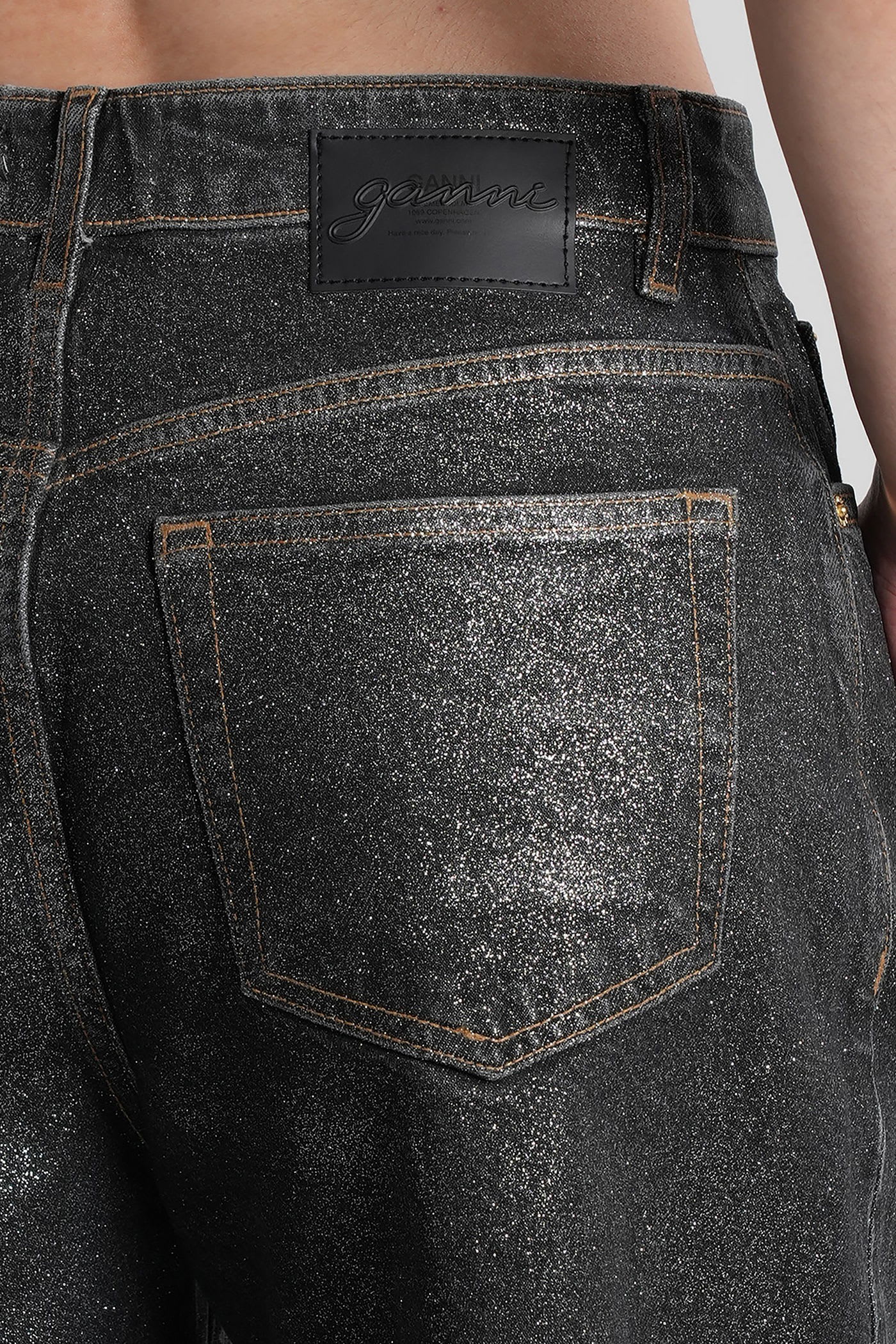 Ganni Shimmery Foil Stary Jeans In Black