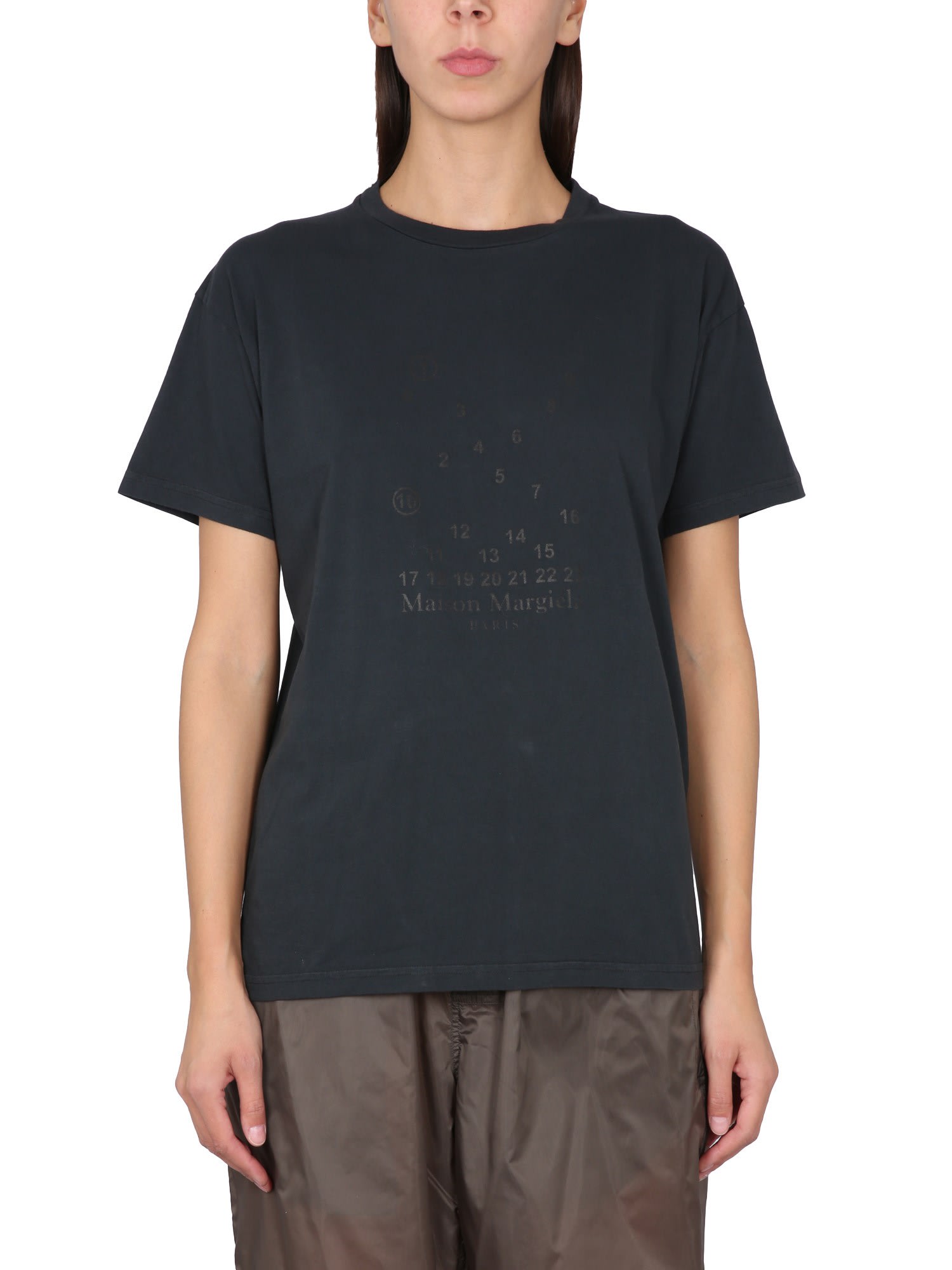 Maison Margiela Elevated Black T-shirt With Distressed Detailing And Signature Logo