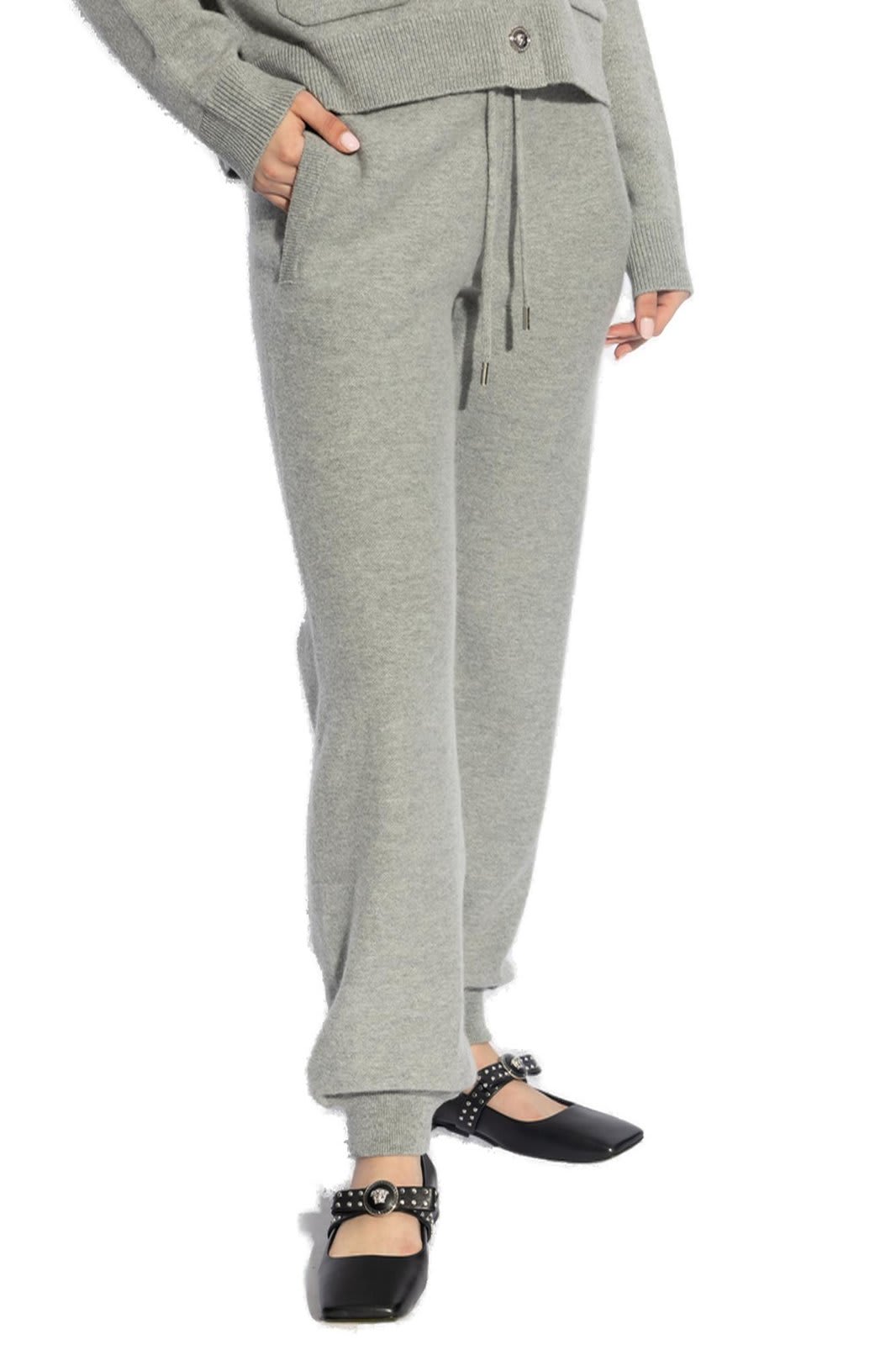 Shop Versace Elasticated Drawstring Waistband Knitted Track Pants In Grigio