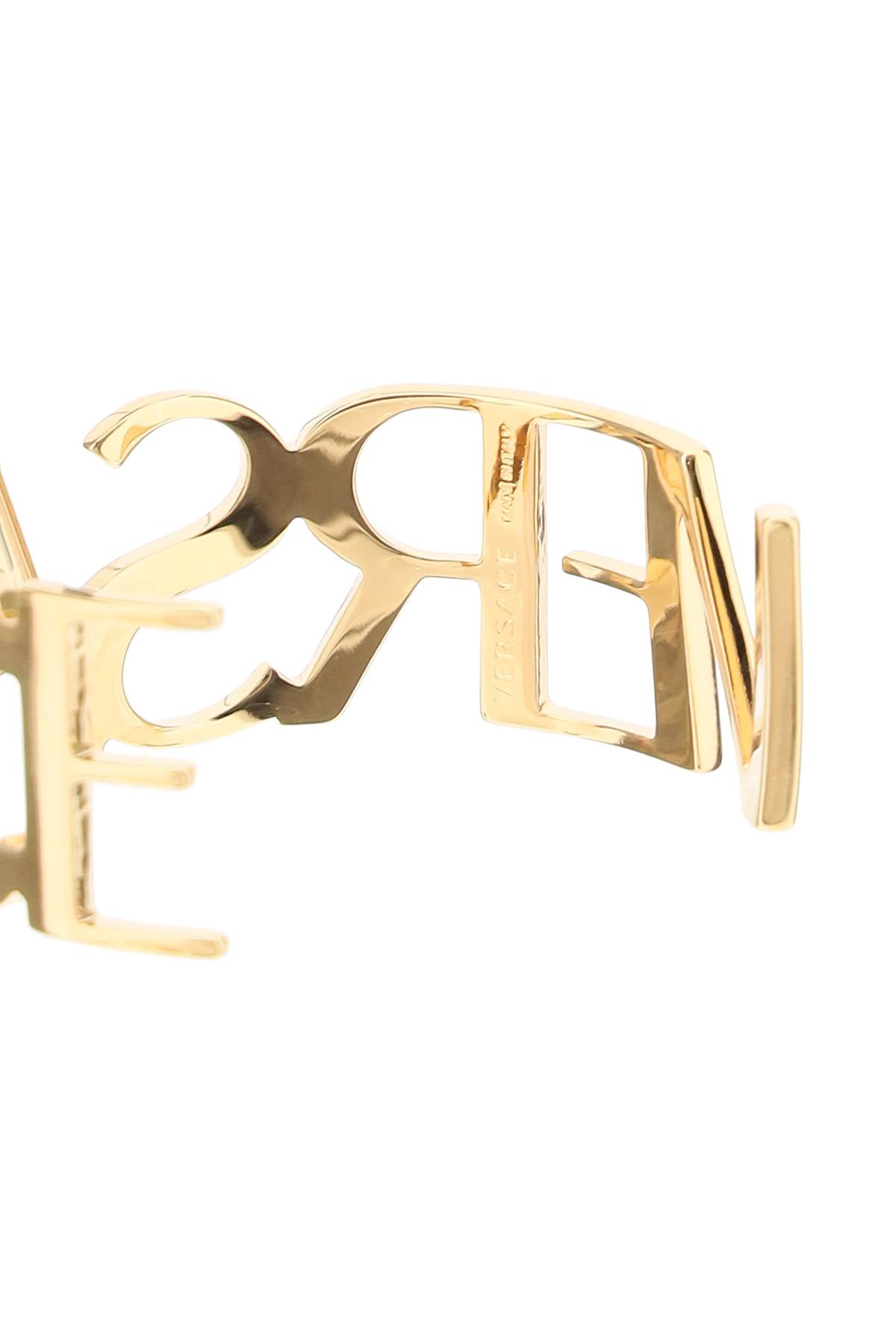 Shop Versace Stiff Logoed Bracelet In  Gold (gold)