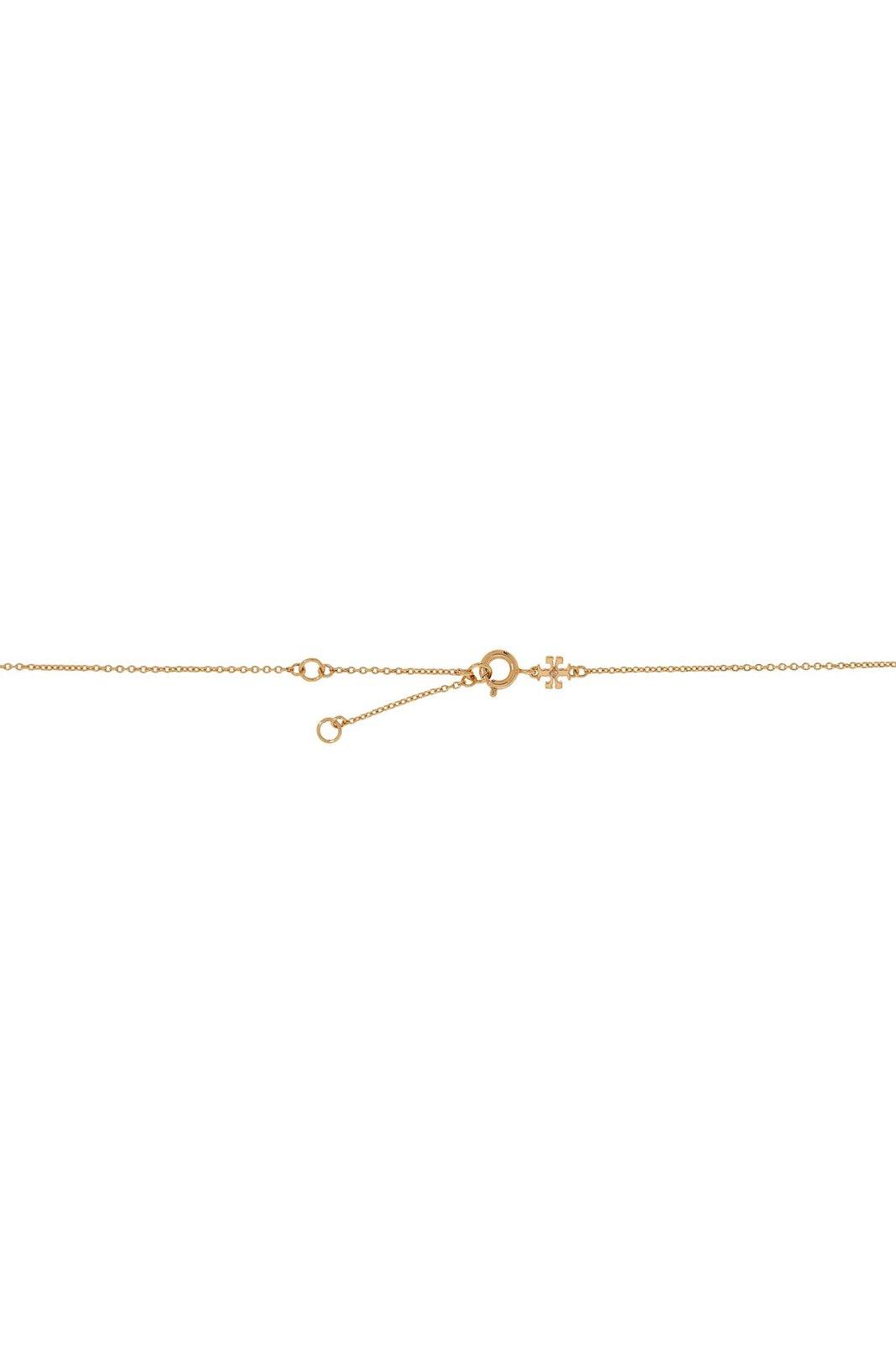 Shop Tory Burch Miller Pavé Interlocking Pendant Necklace In Gold/crystal