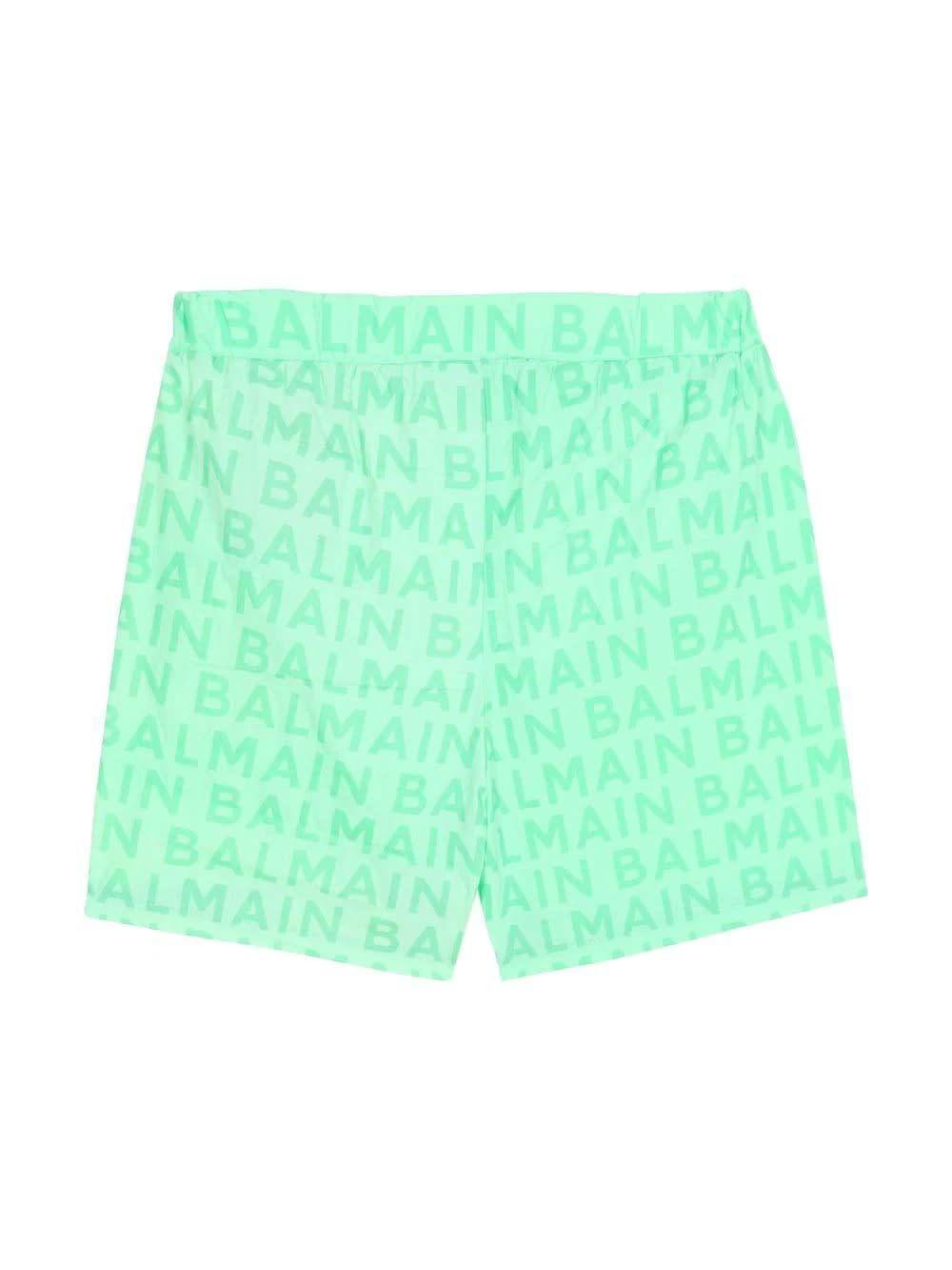 Shop Balmain Light Green Swim Shorts With All-over Logo