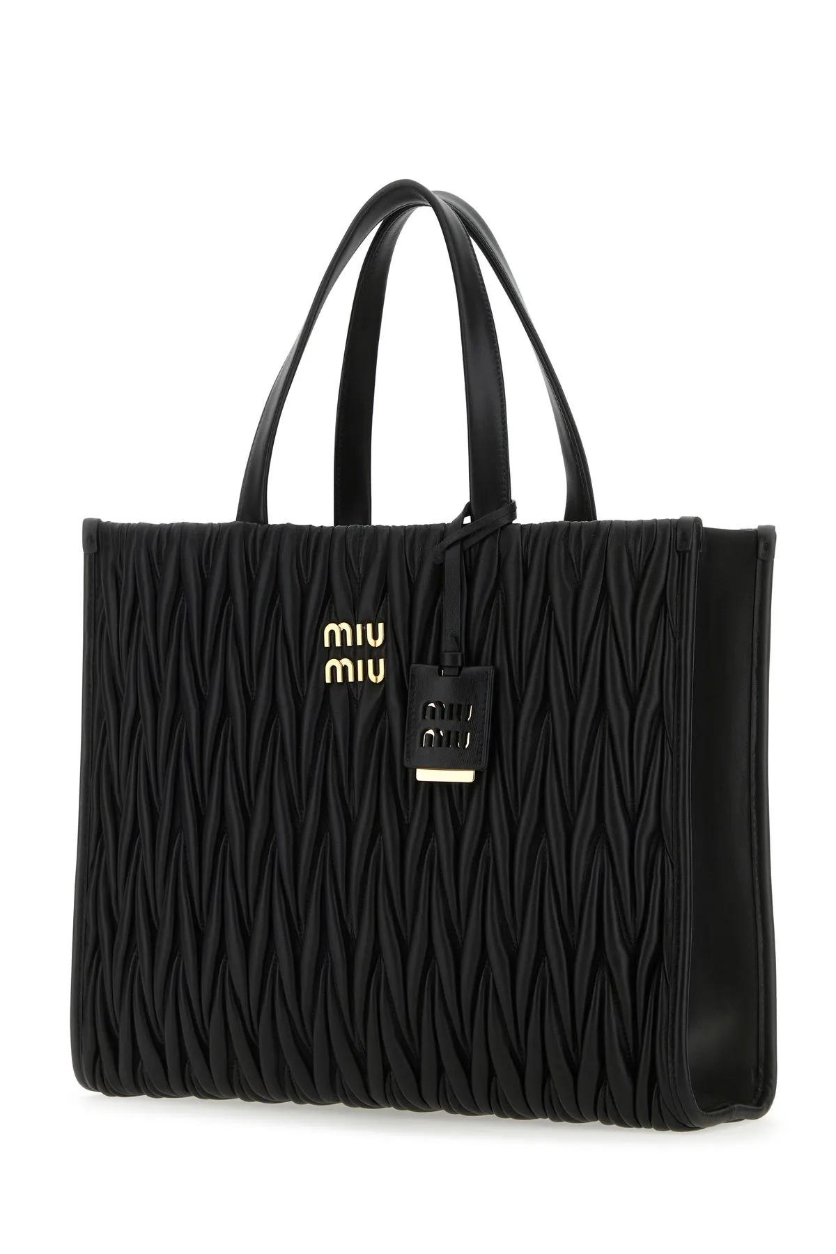 miumiu's Nappa leather pocket bag is quickly becoming a celeb favorit, Miu  Miu Bag