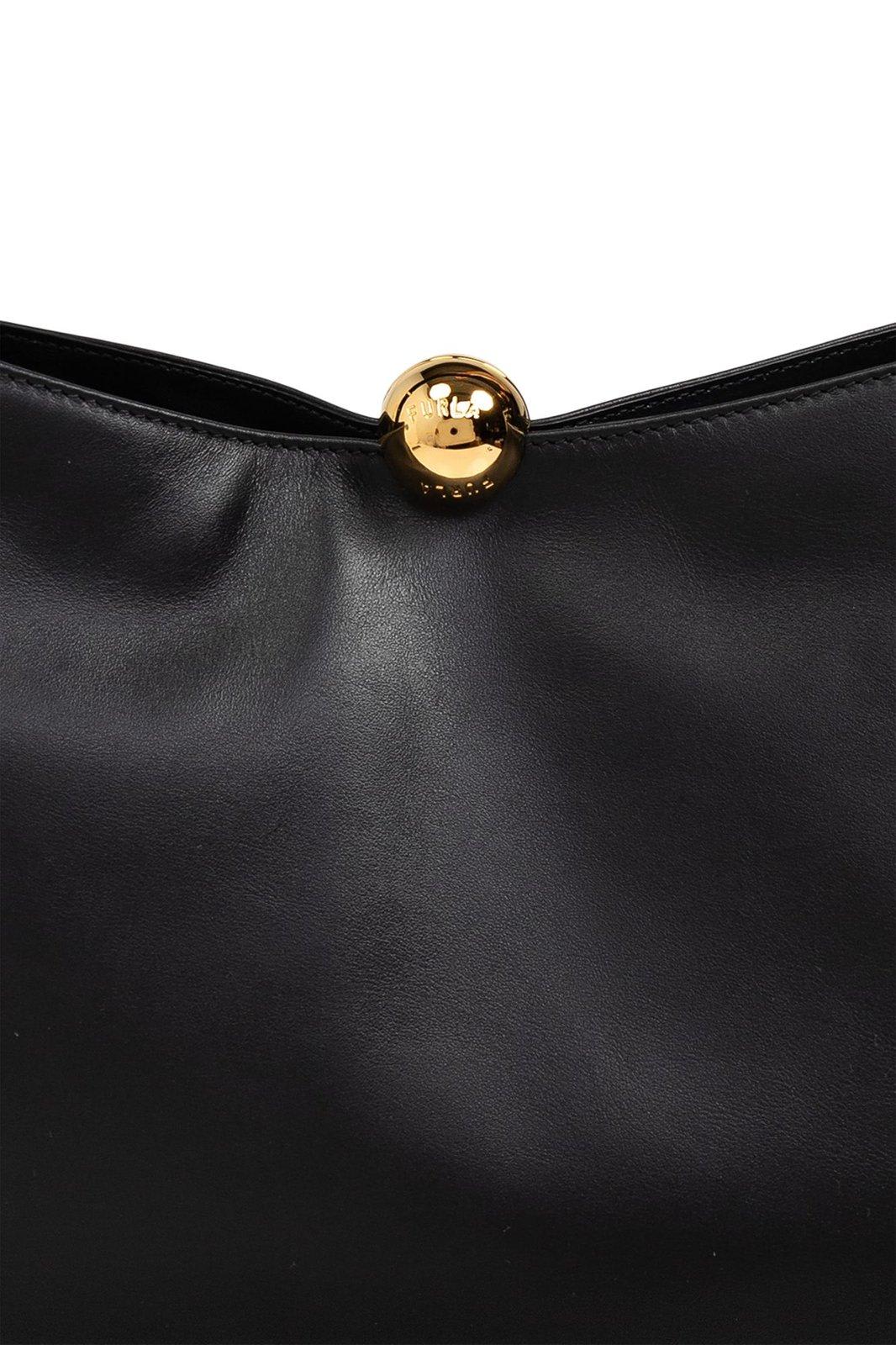 Shop Furla Snap-lock Top Shoulder Bag In Black