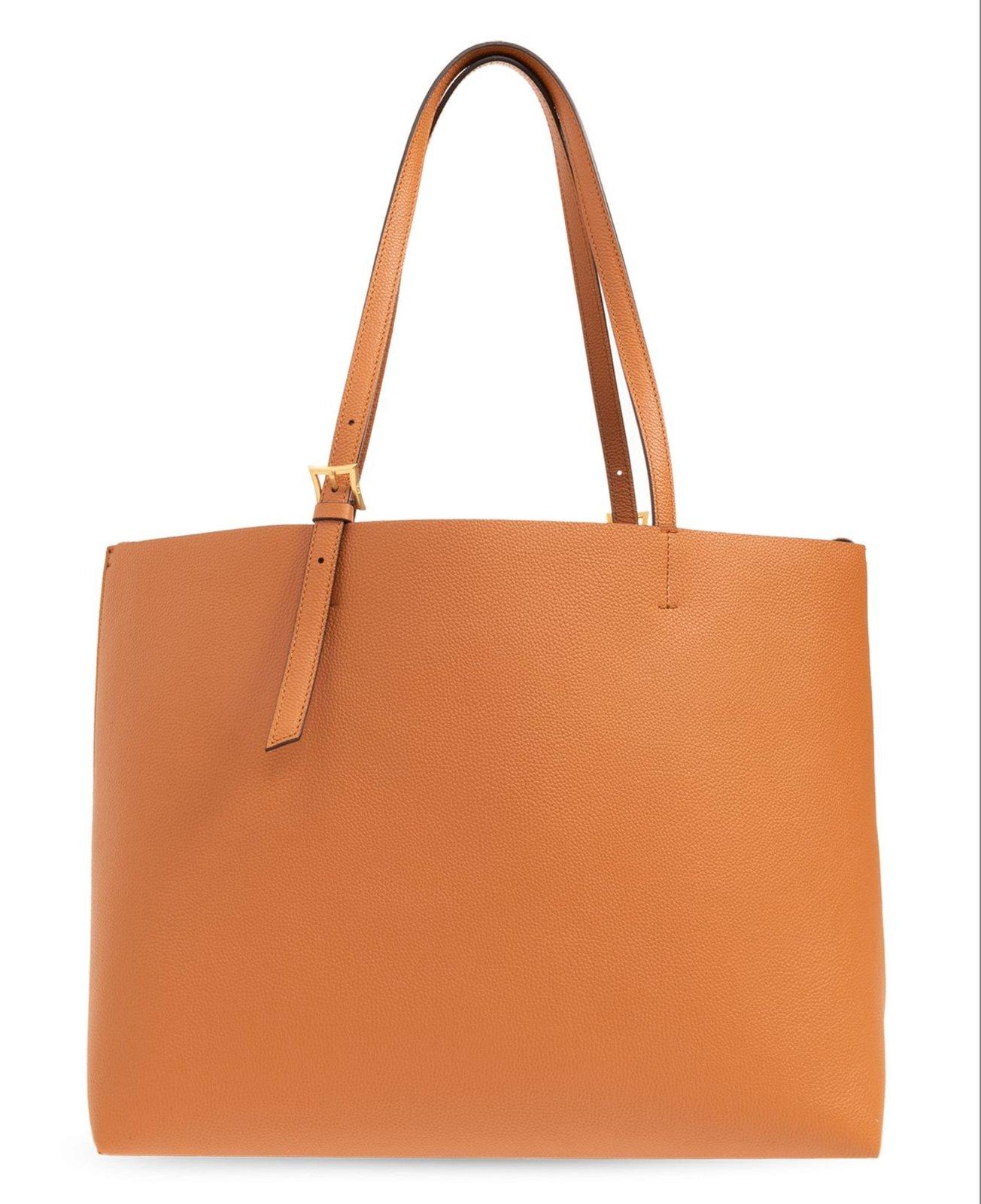 Shop Mcm Himmel Logo Debossed Shoulder Bag In Brown