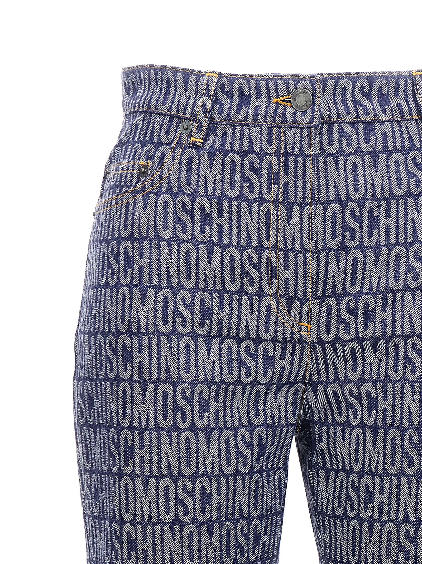 Shop Moschino Logo Jeans In Blue
