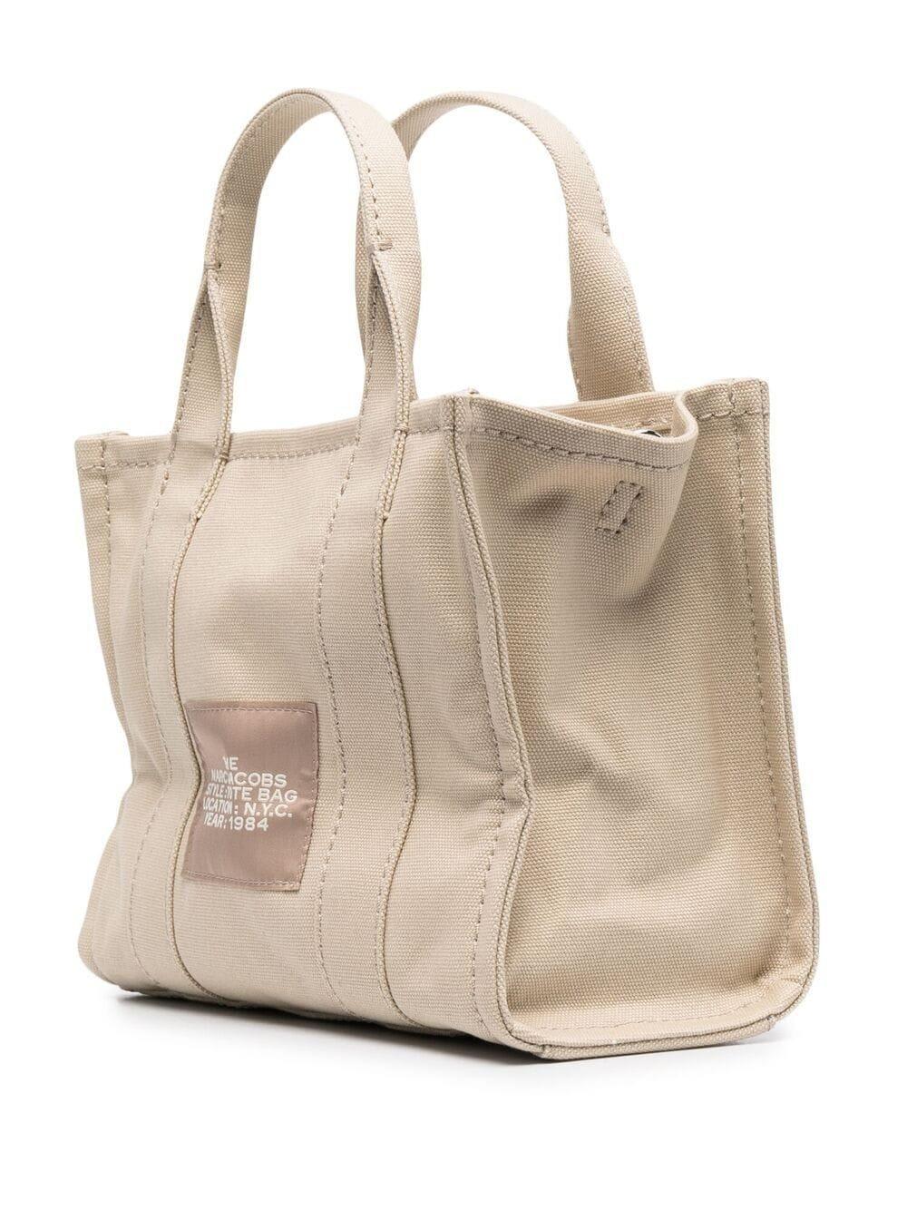 Shop Marc Jacobs The Mini Traveler Tote Bag In Beige