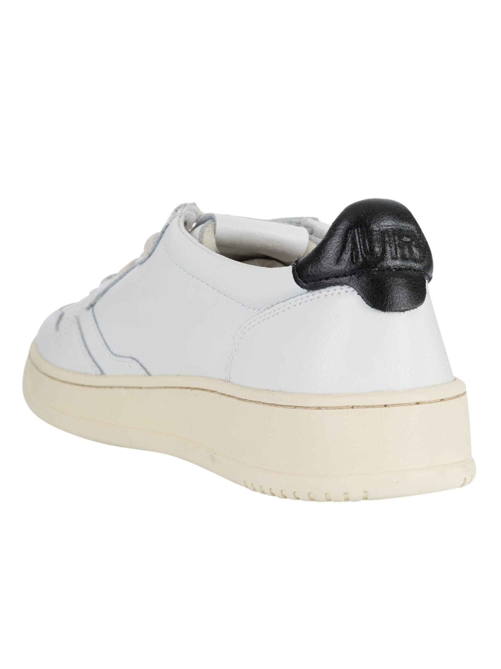 Shop Autry Logo Patched Low Sneakers In White/black