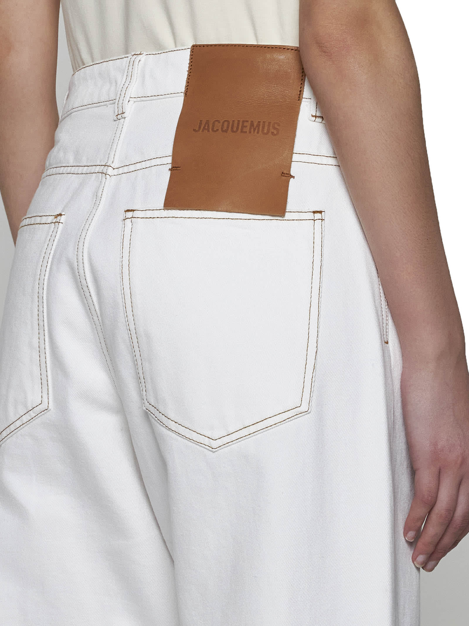 Shop Jacquemus Jeans In Off-white/tabaac