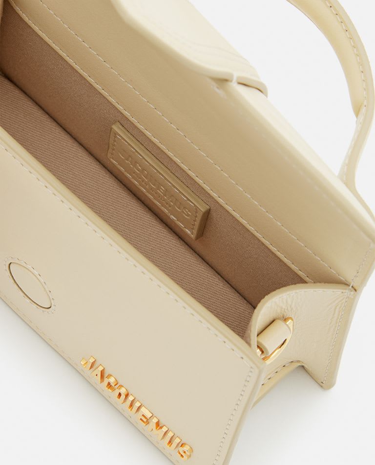 Shop Jacquemus Le Bambino Leather Top Handle Bag In Ivory