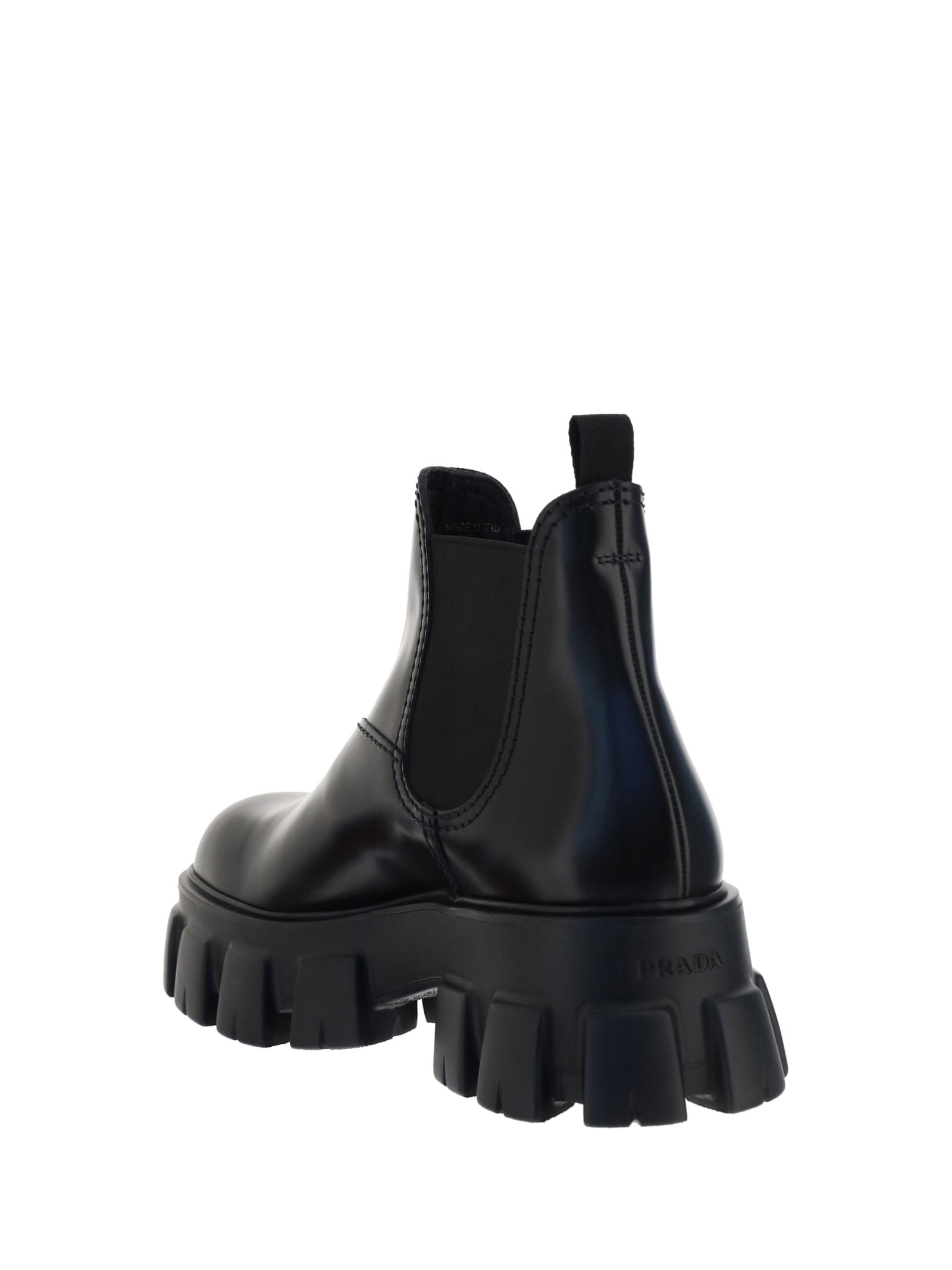 Shop Prada Ankle Boots In Nero