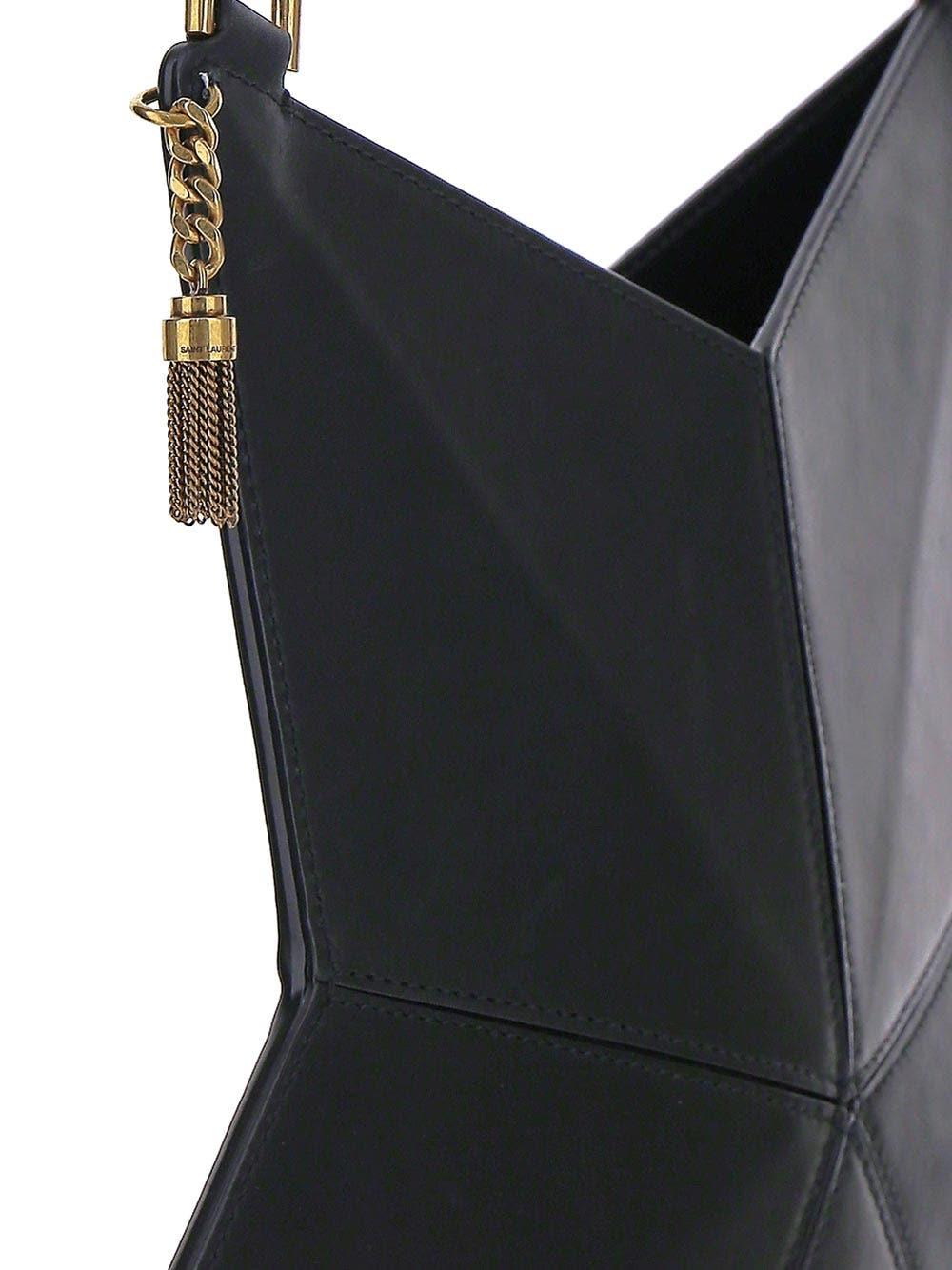 Shop Saint Laurent Astro Shoulder Bag In Vegetable-tanned Leather In Black