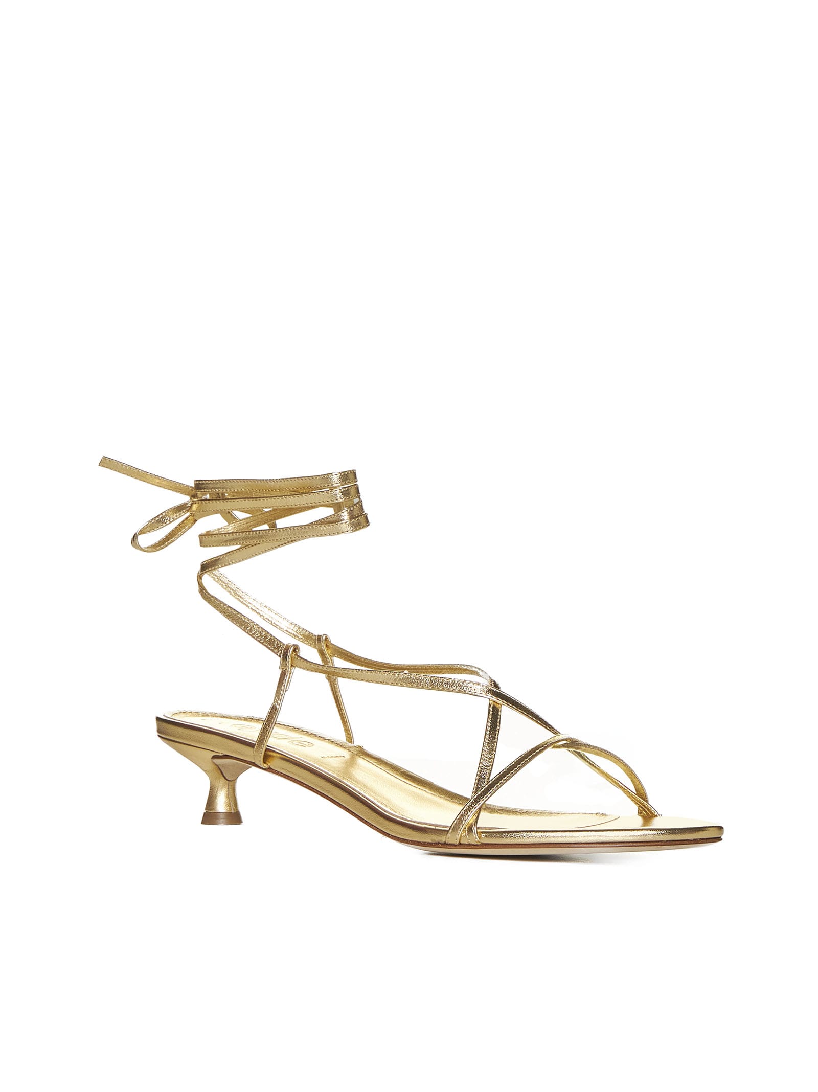 Shop Aeyde Sandals In Gold
