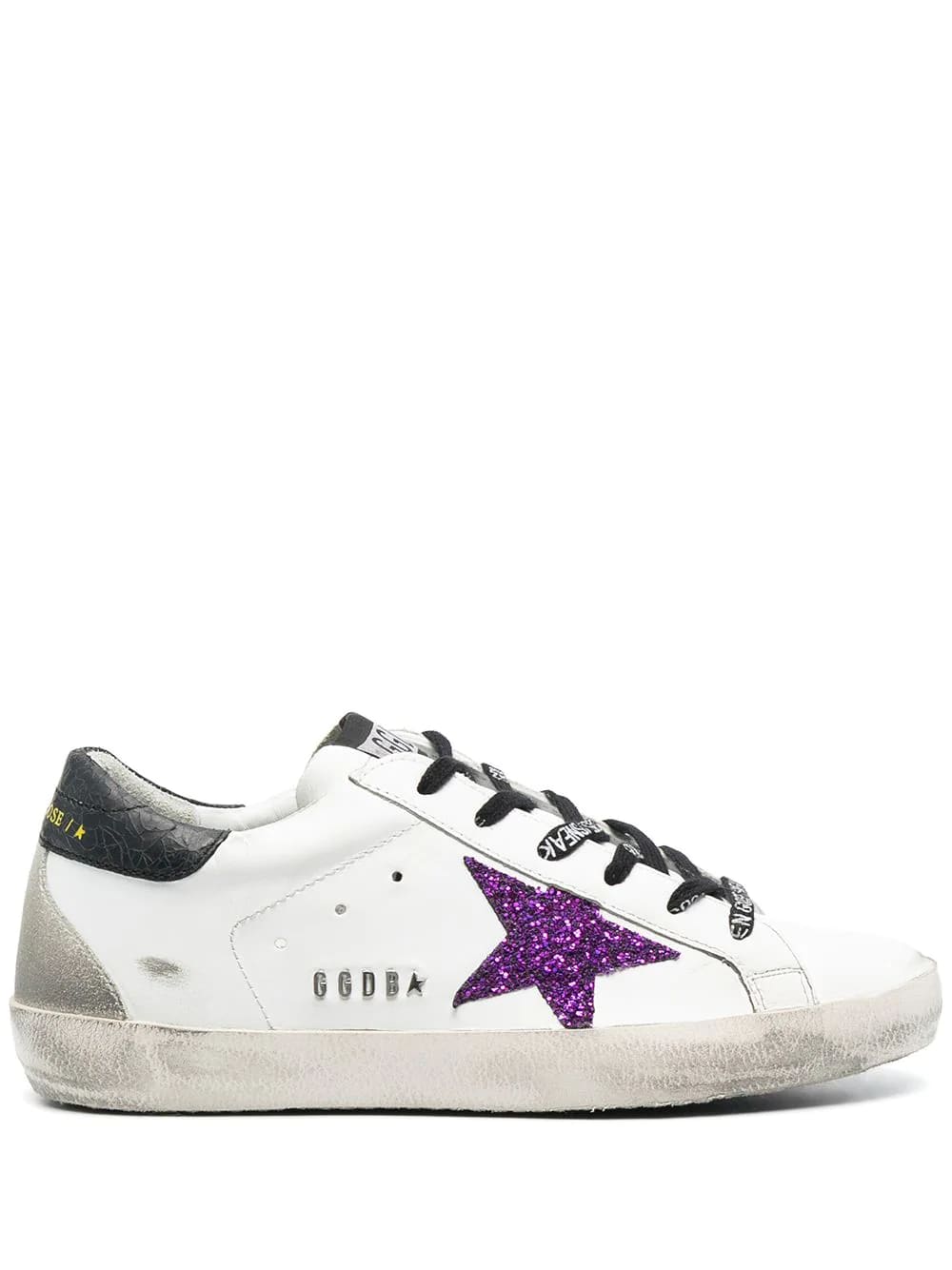 Buy Golden Goose Woman White Super-star Sneakers With Black Spoiler And Purple Glitter Star online, shop Golden Goose shoes with free shipping