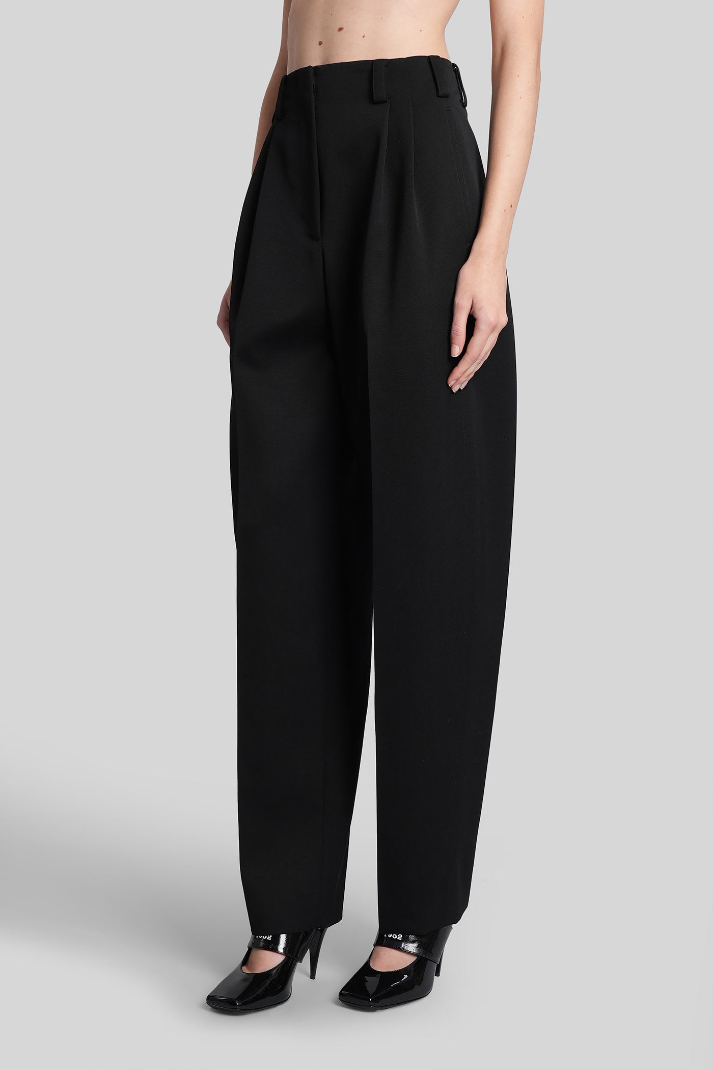 Givenchy Slashed Double-pleated Tapered-leg Trousers In Black