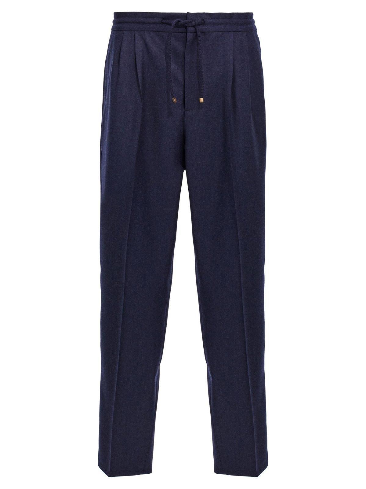 Shop Brunello Cucinelli Pleated Tapered Leg Trousers In Blue