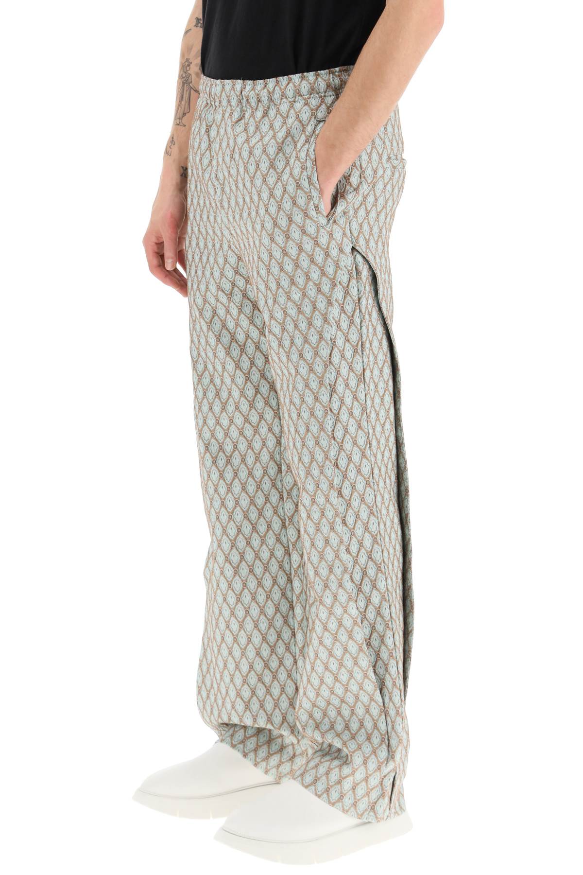 Shop Andersson Bell Geometric Jacquard Pants With Side Opening In Beige (beige)