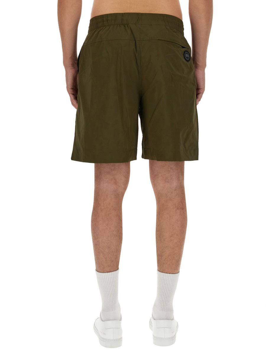 Shop Canada Goose Nylon Bermuda Shorts In Green