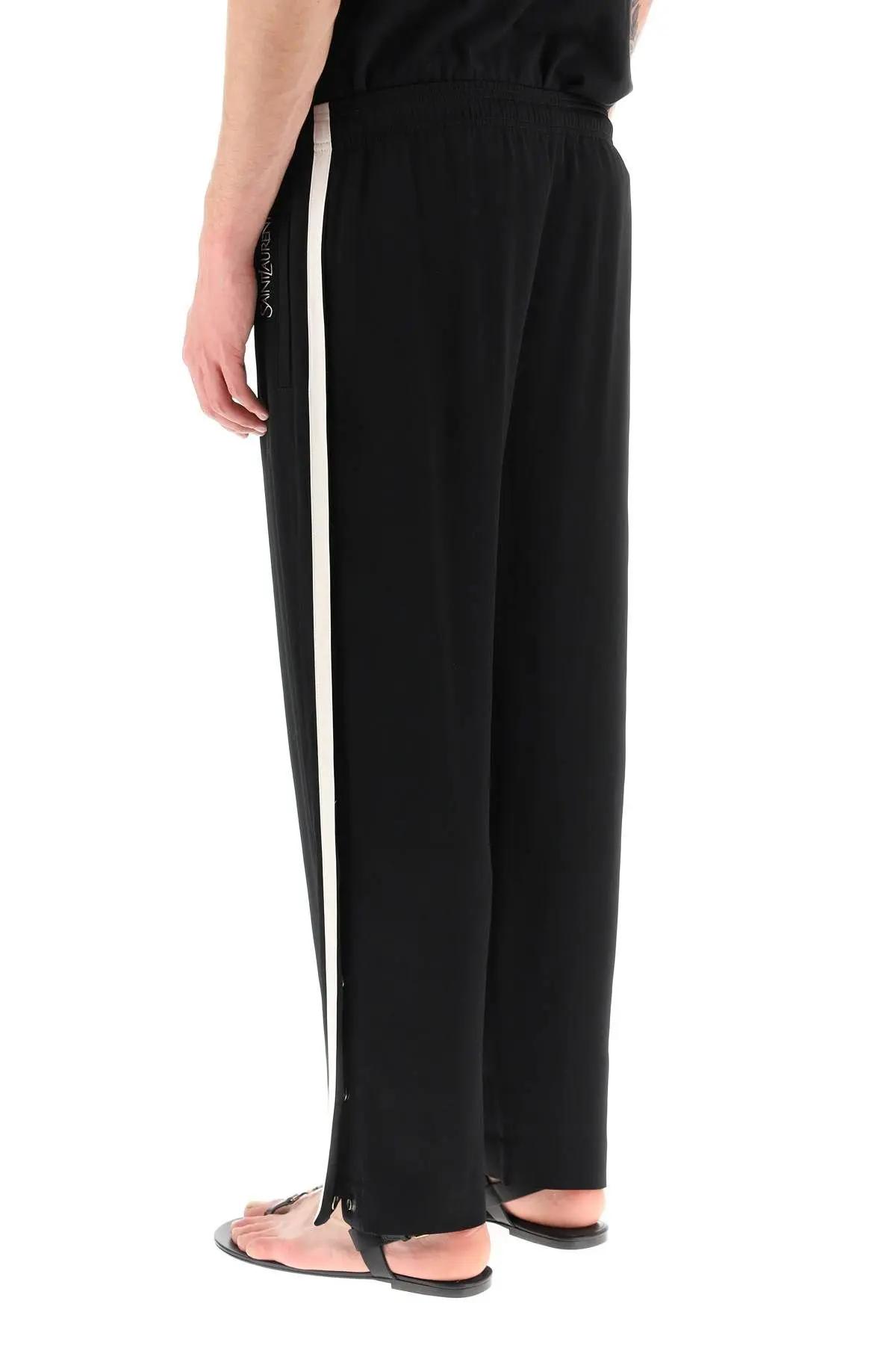 Shop Saint Laurent Crêpe Satin Jogger Pants In Black