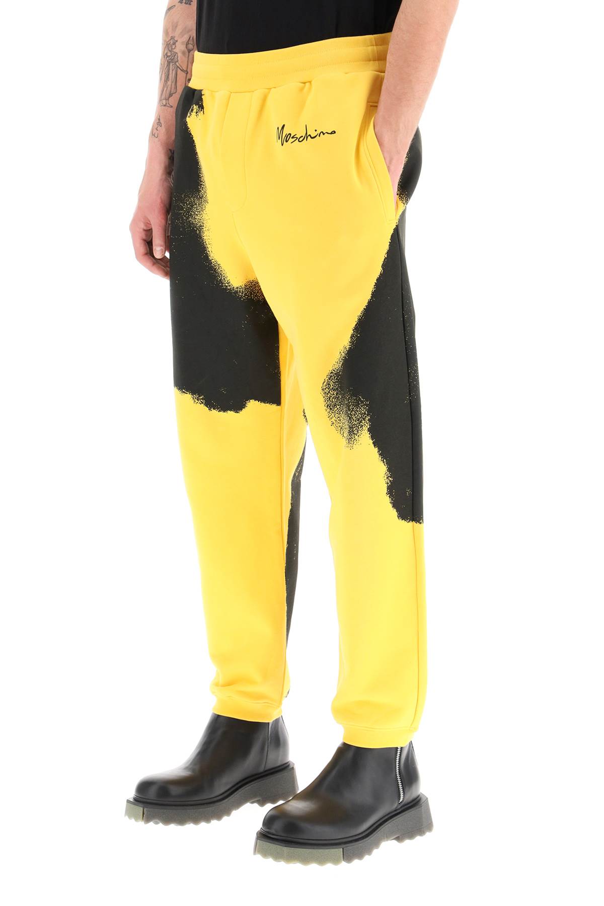 Shop Moschino Graphic Print Jogger Pants With Logo In Fantasia Giallo (yellow)