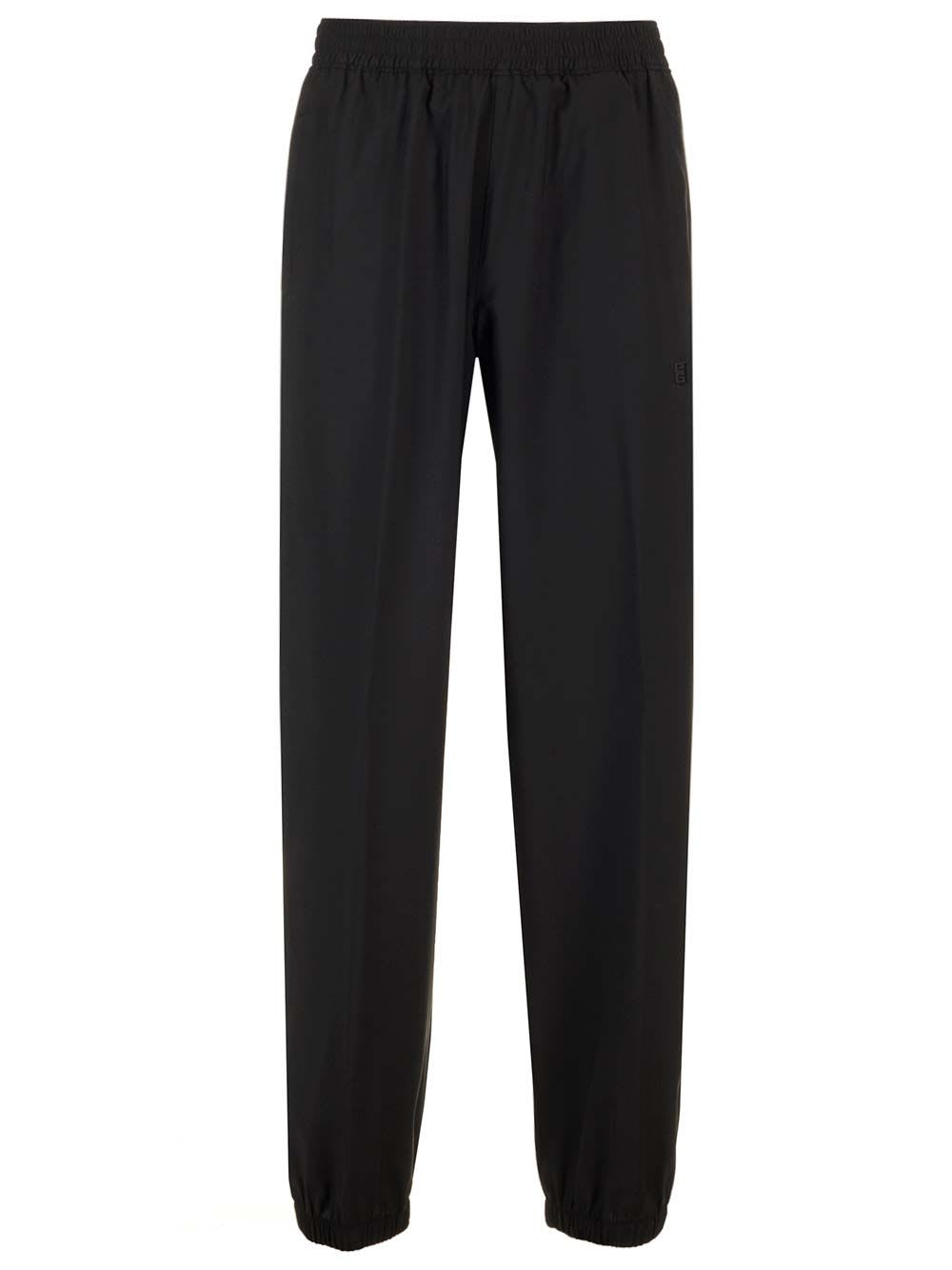 Shop Givenchy Wool Jogger Pants In Black