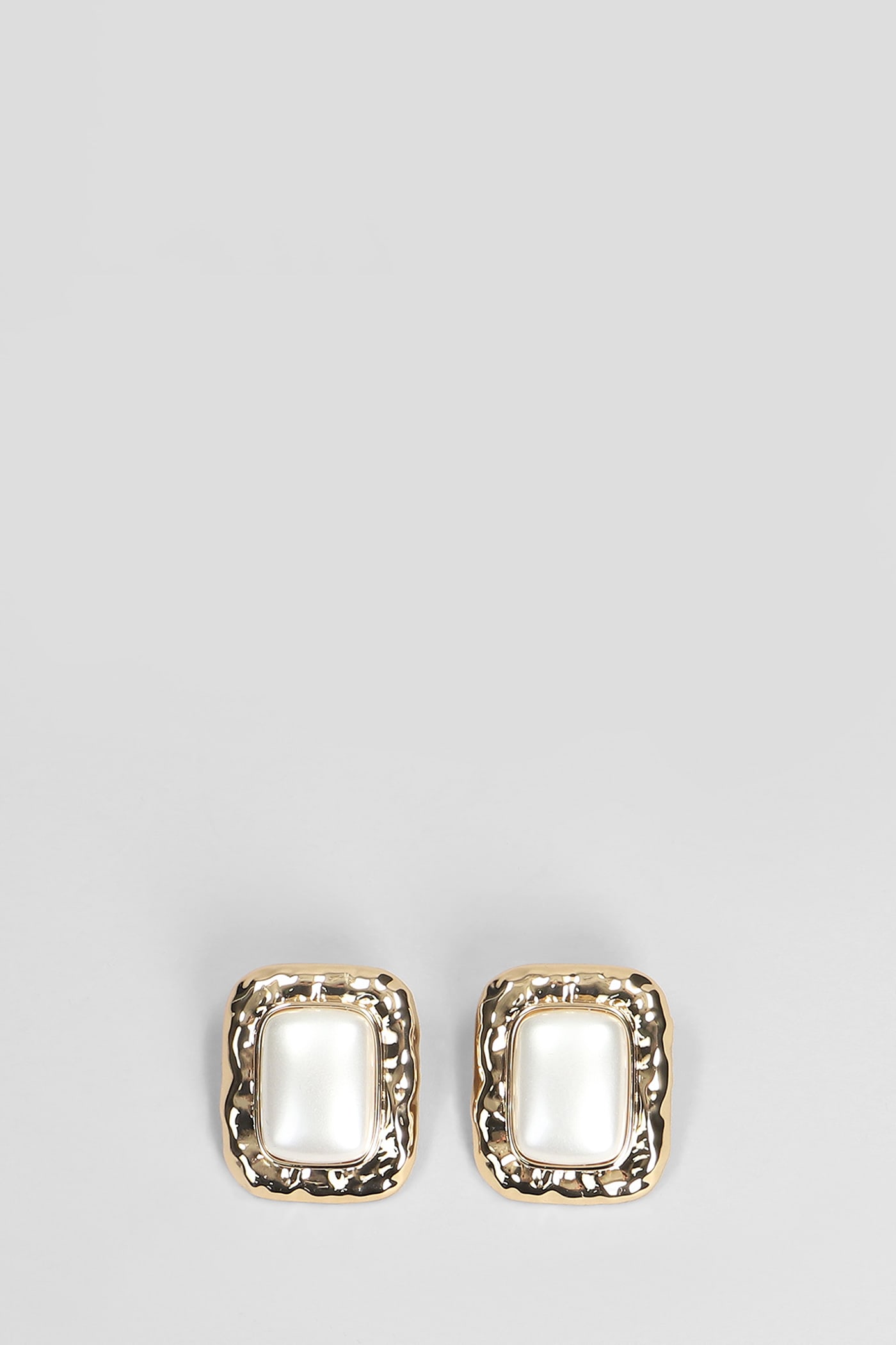 In Gold Brass