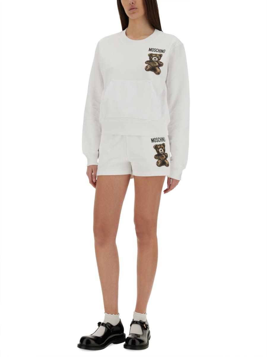 Moschino "graphic Print" Crew Neck Sweatshirt With Front Pocket In White