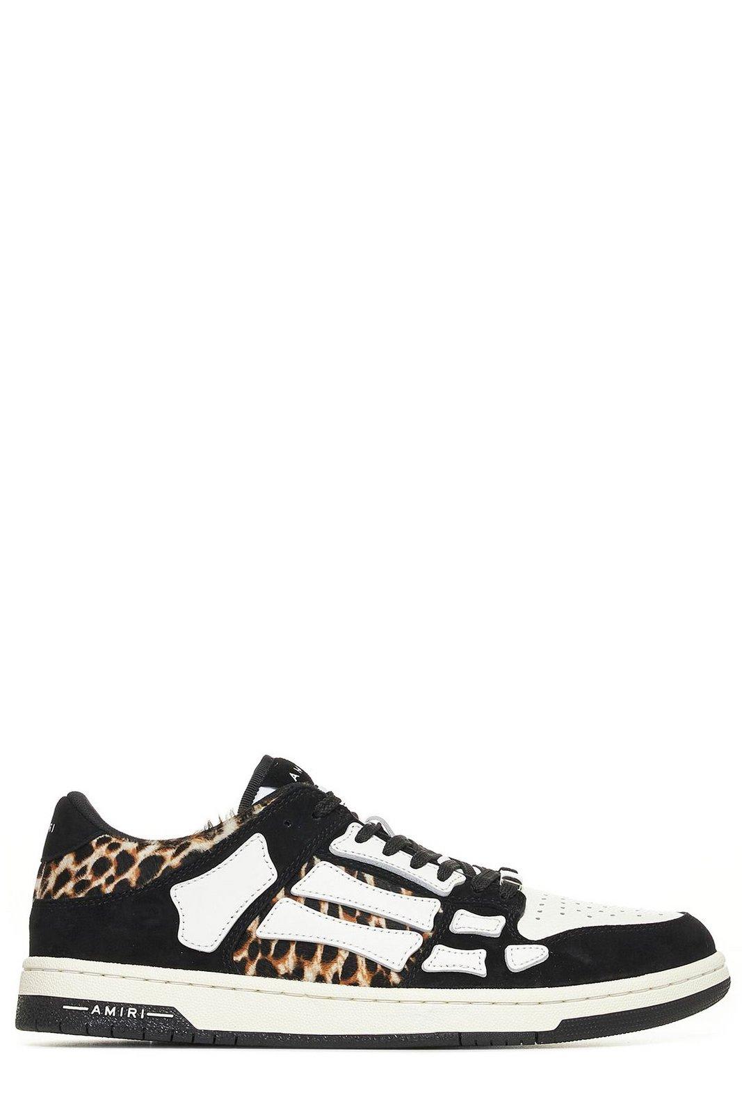 Shop Amiri Skeleton Patch Round Toe Sneakers In Black/white