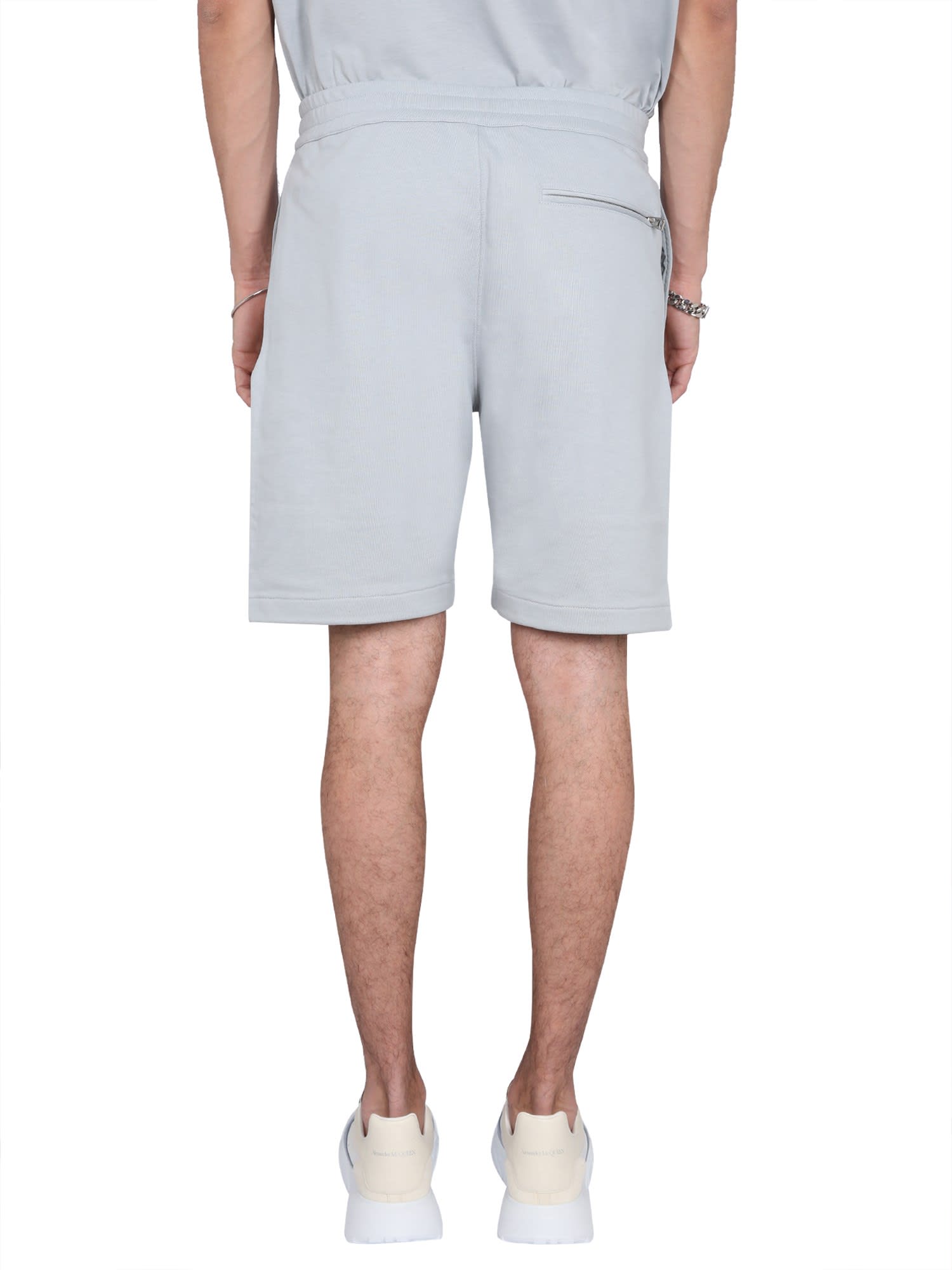 Alexander Mcqueen Men Bermuda Shorts With Graffiti Logo Print In Grey