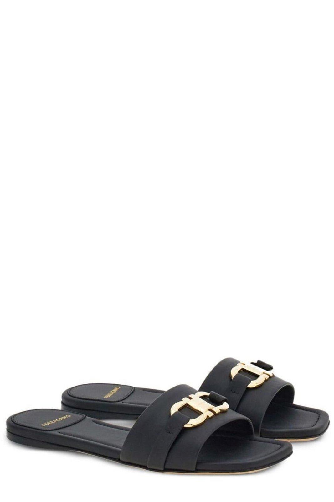 Shop Ferragamo Gancini Plaque Slip-on Slides In Nero