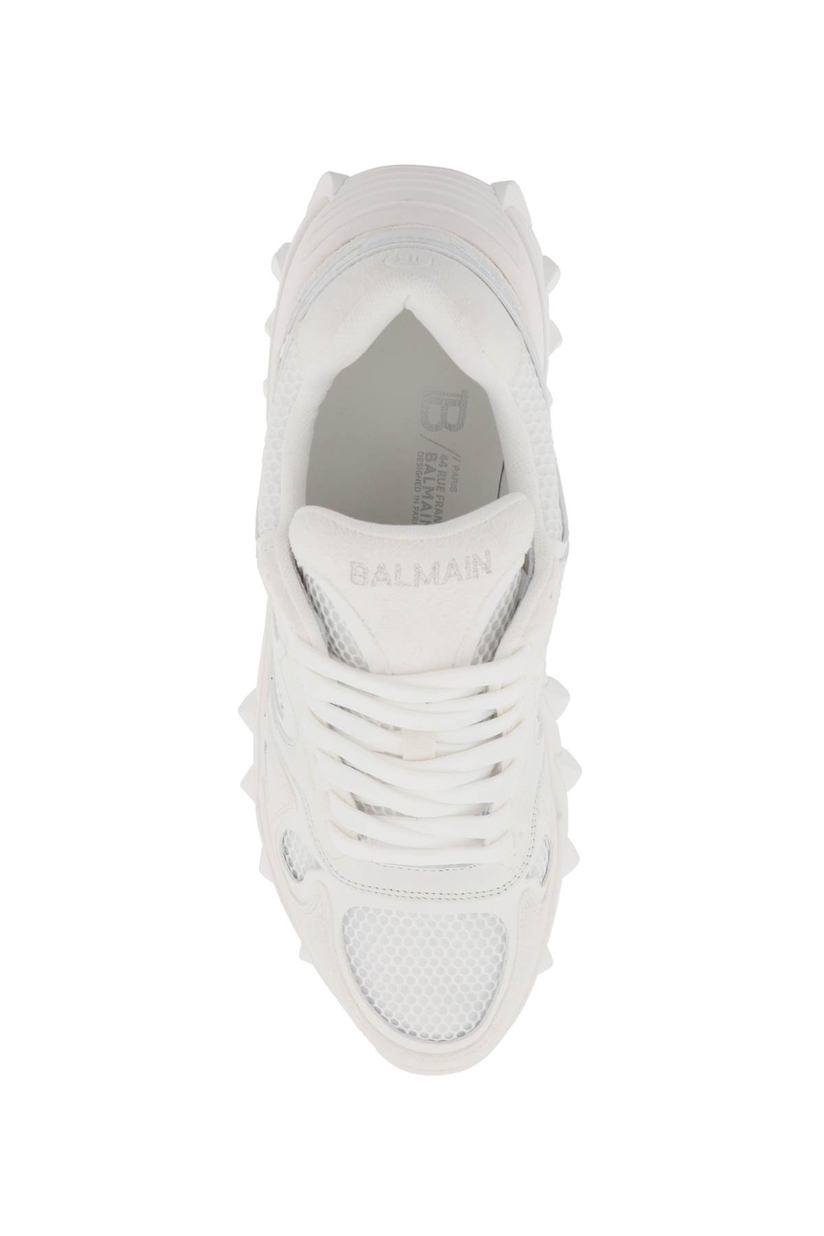 Shop Balmain B-east Sneakers In Blanc Optique (white)