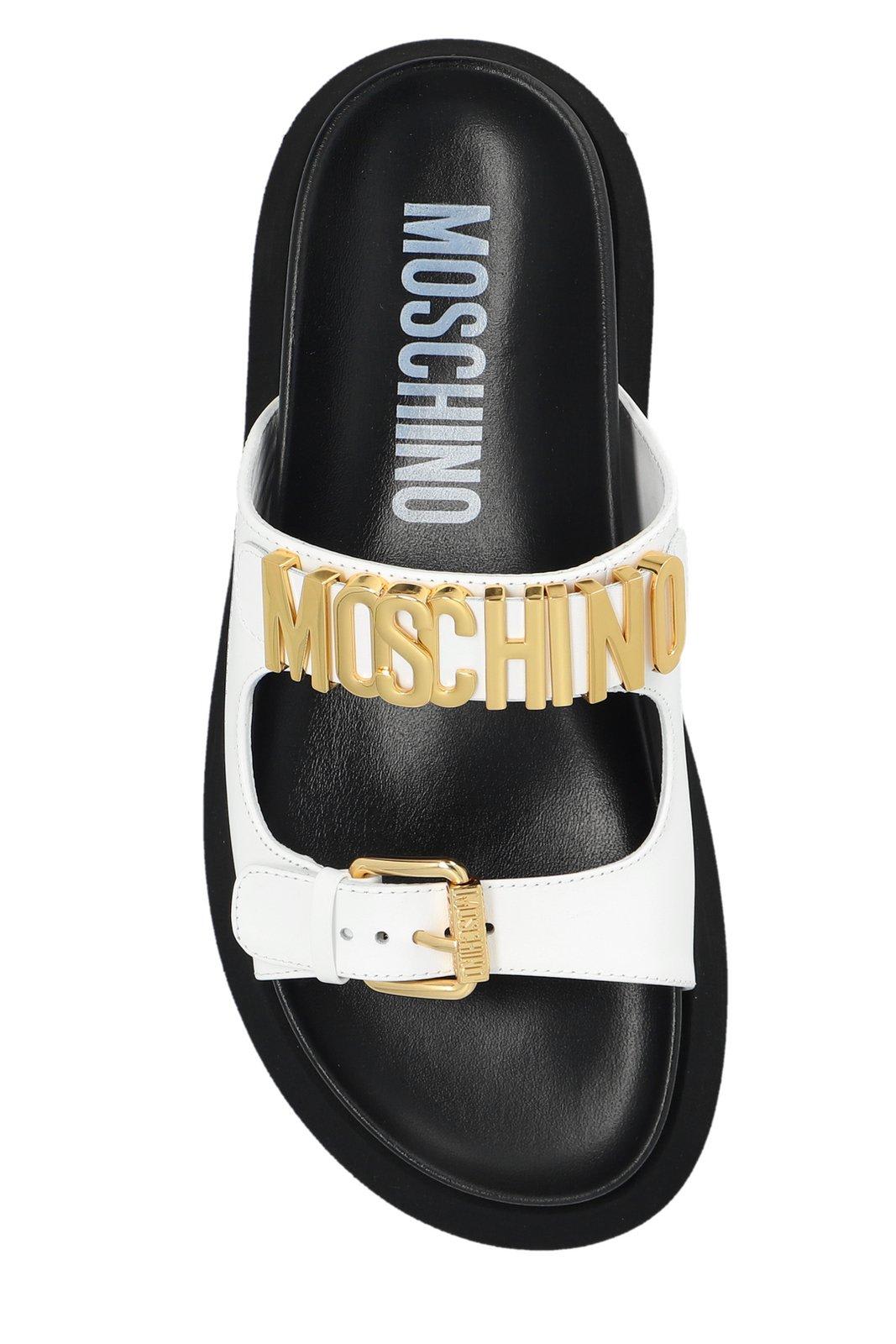 Shop Moschino Logo Lettering Slip-on Sandals In Bianco
