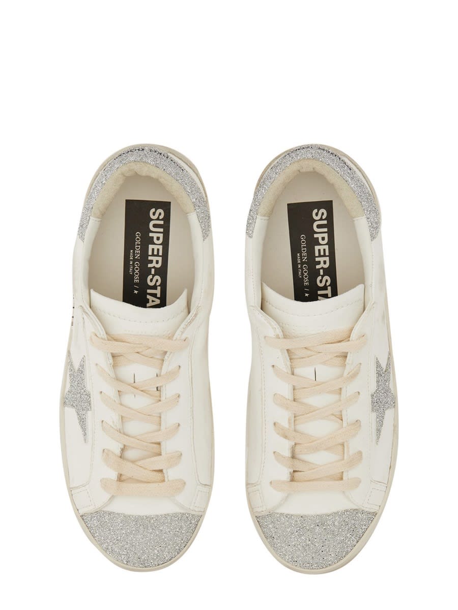 Shop Golden Goose Super Star Sneaker In White