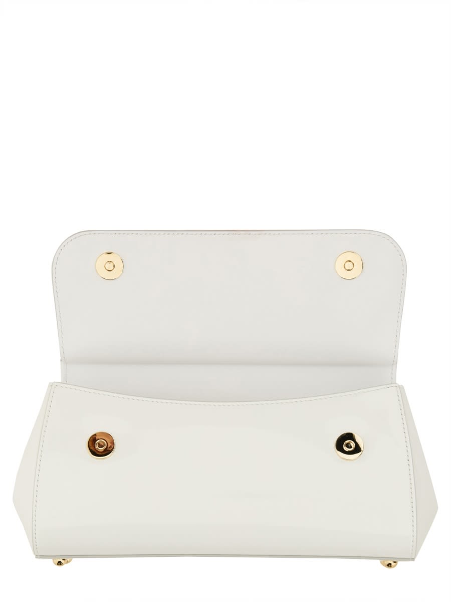 Shop Dolce & Gabbana Elongated Sicily Handbag In White