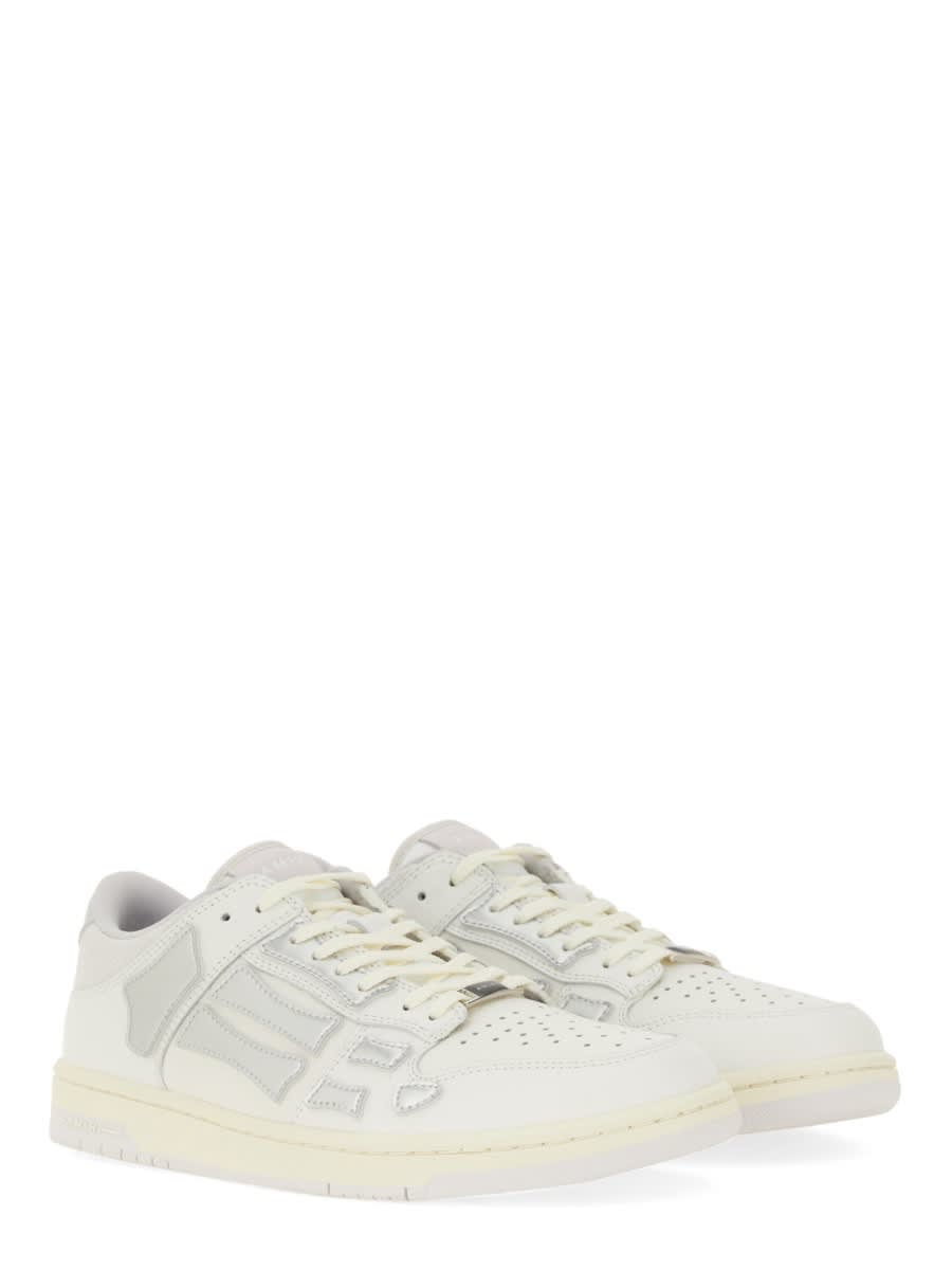 Shop Amiri Metallic Skel Sneaker In White