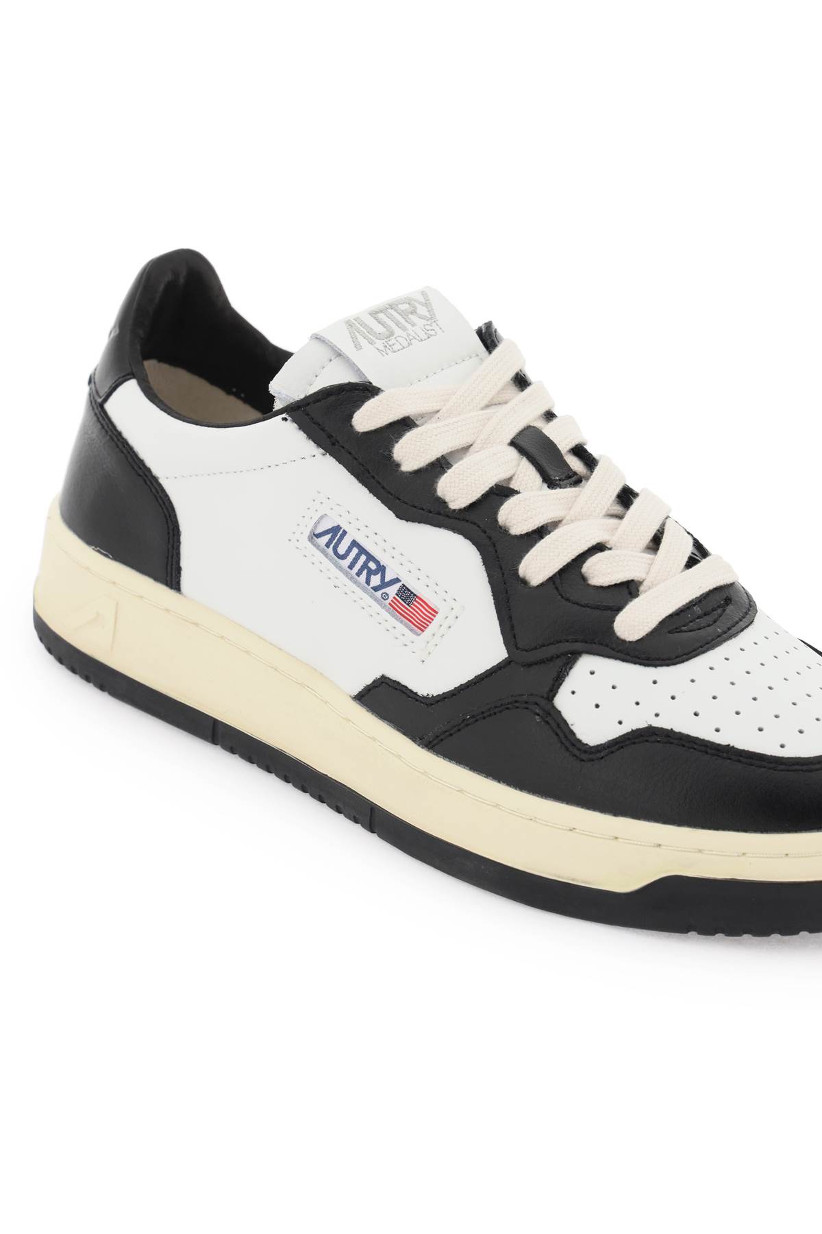 Shop Autry Medalist Low Sneakers In White Black (white)