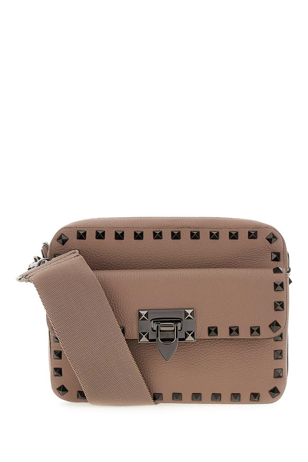 Shop Valentino Garavani Rockstud Zip-up Messenger Bag In Beige