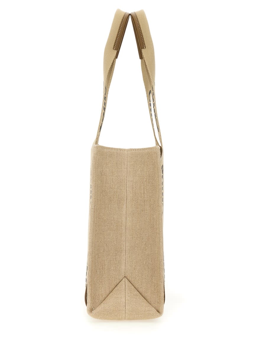 Shop Chloé Woody Tote Bag In Beige