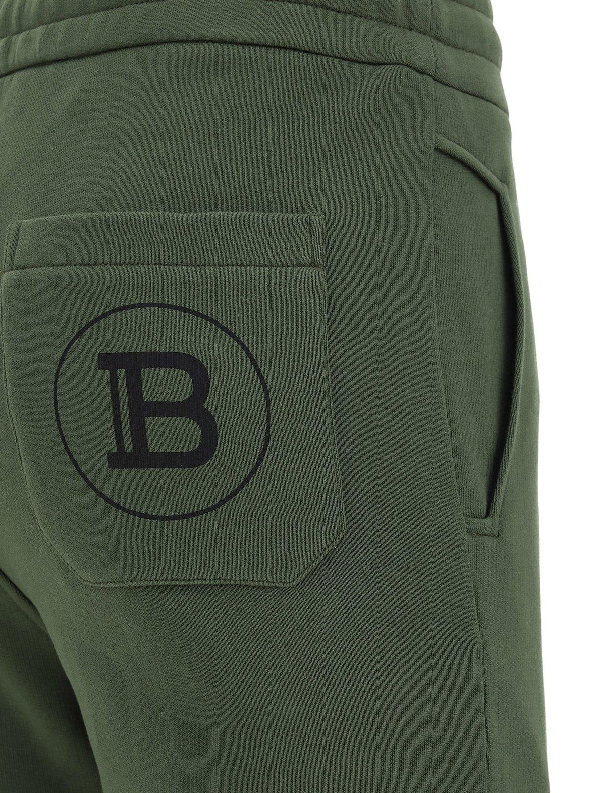 Shop Balmain Logo Printed Drawstring Jogger Pants In Green
