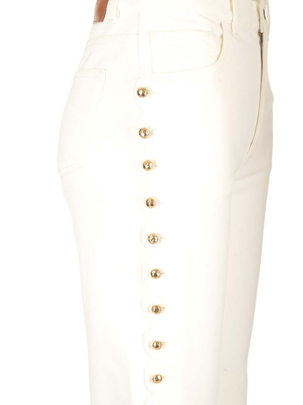 Shop Chloé Cropped Jeans With Embellished Profile In White