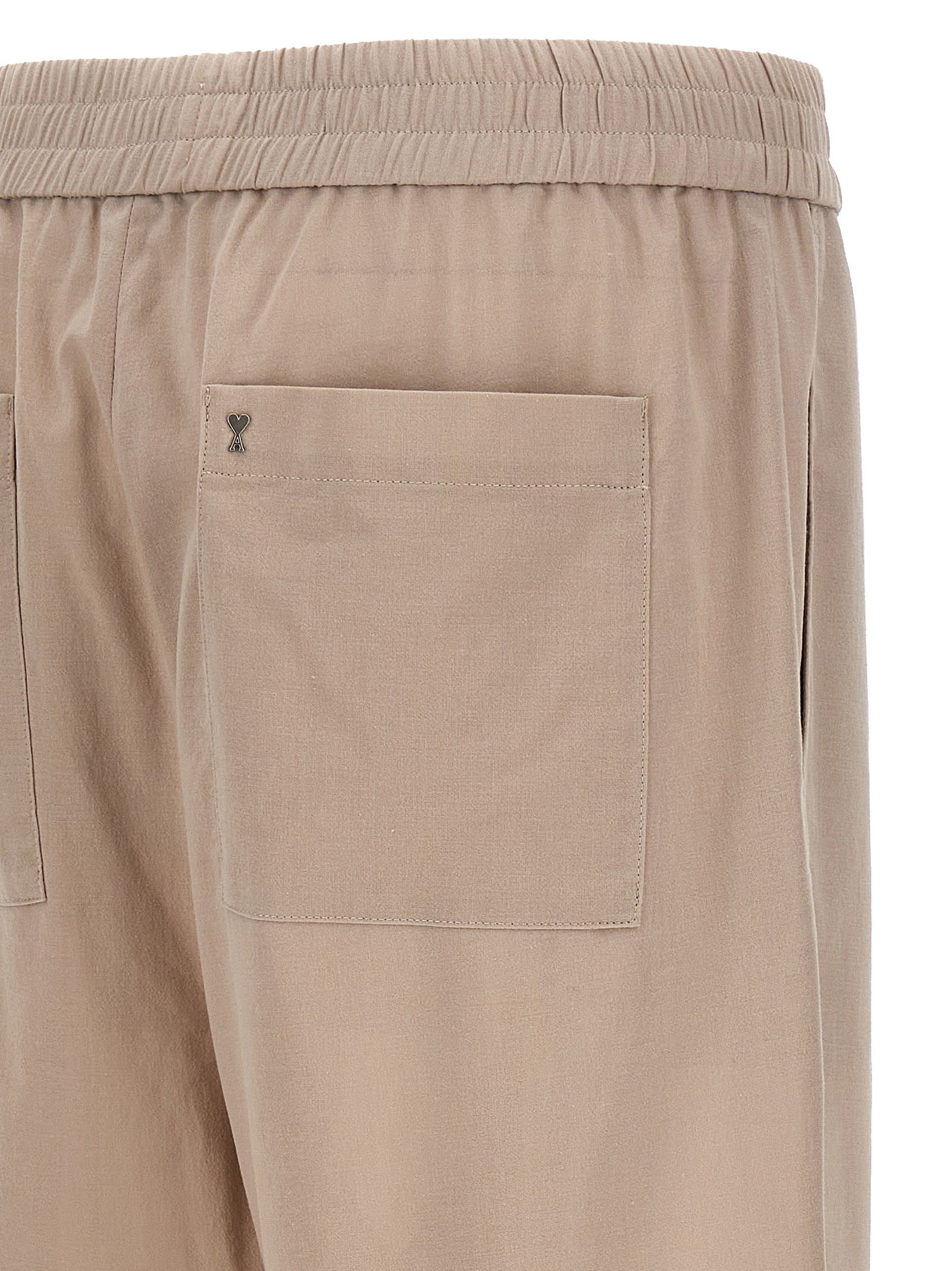 Shop Ami Alexandre Mattiussi Logo Plaque Trousers In Beige
