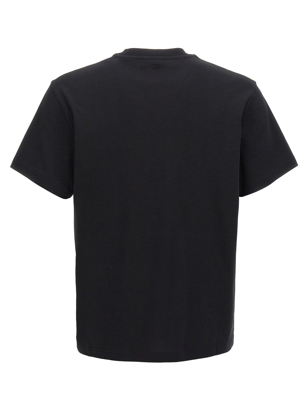 Shop Ami Alexandre Mattiussi Logo Embossed Crewneck T-shirt In Black