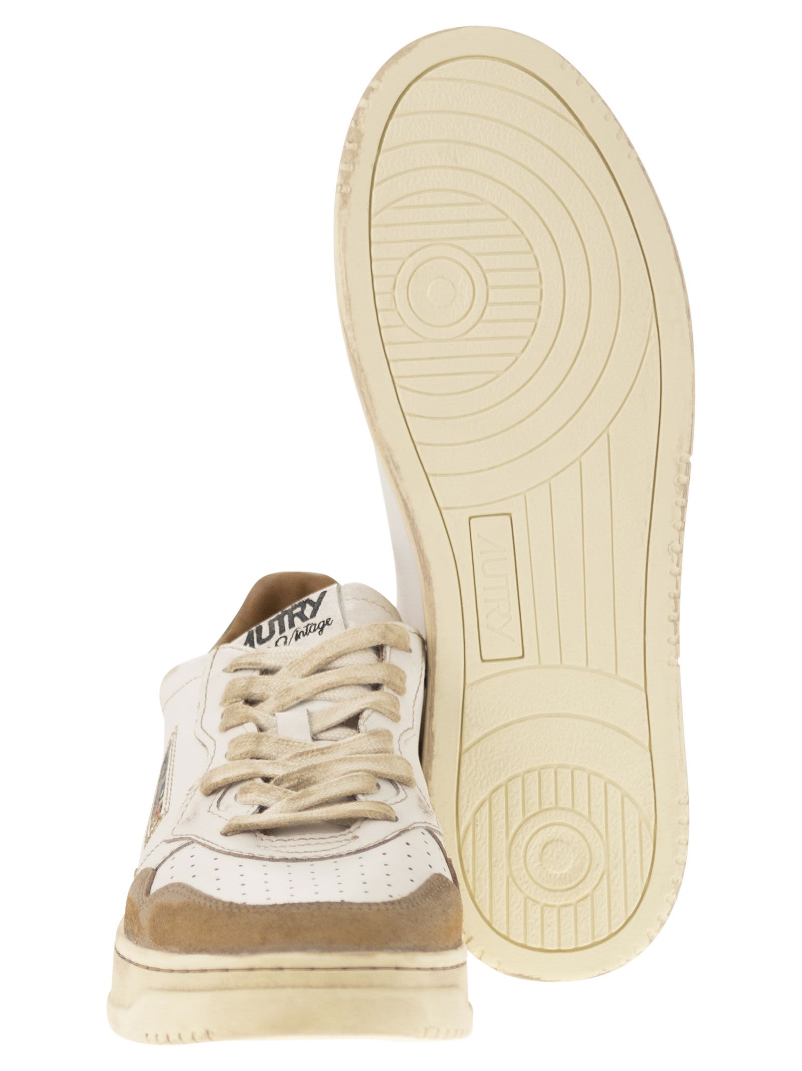 Shop Autry Super Vintage - Leather Sneakers In White/beige