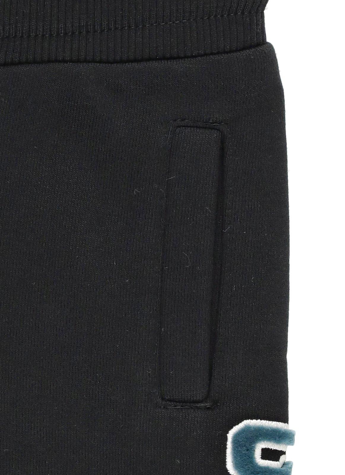 Shop Givenchy Logo Flocked Drawstring Track Pants In Black